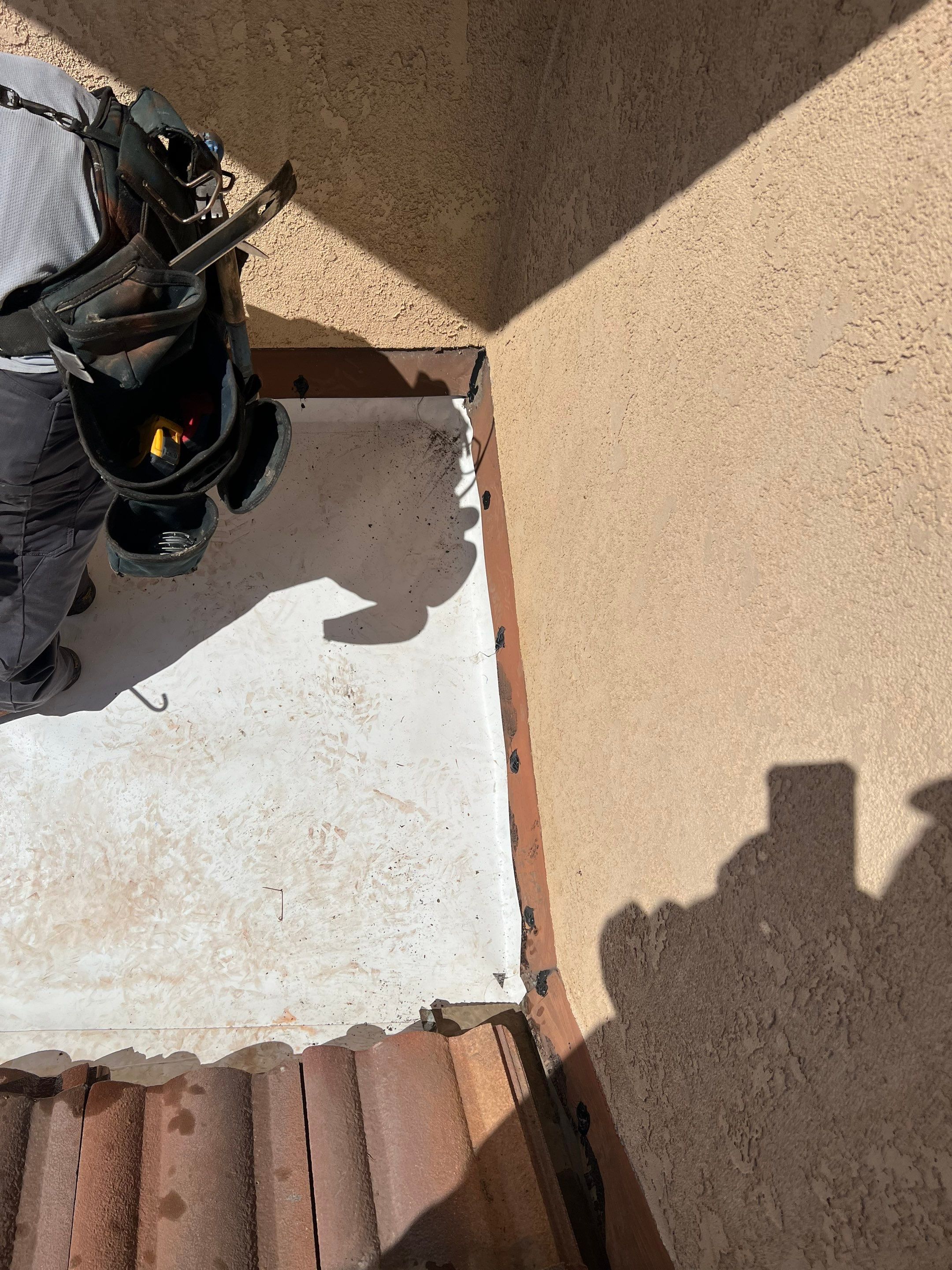 Tile Roof repair by Grandmark Service Company