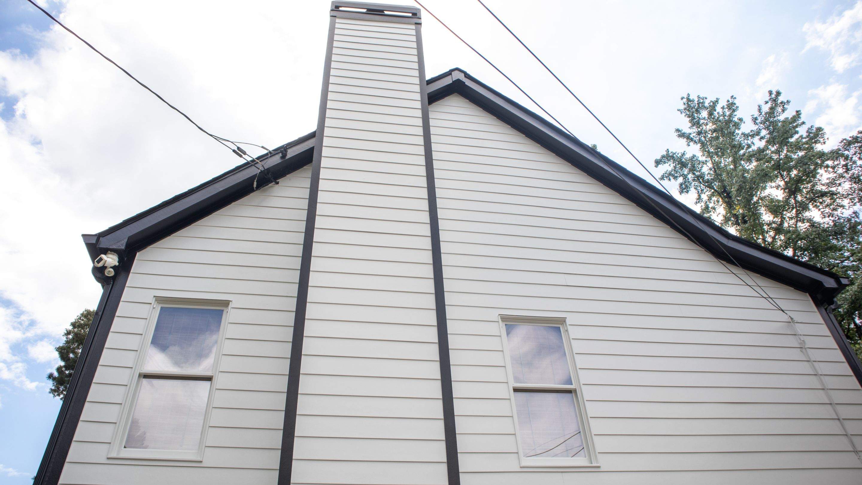James Hardie Siding Install, Rotten Wood and Gutter Replacement and Exterior Painting by Nelson Exteriors 