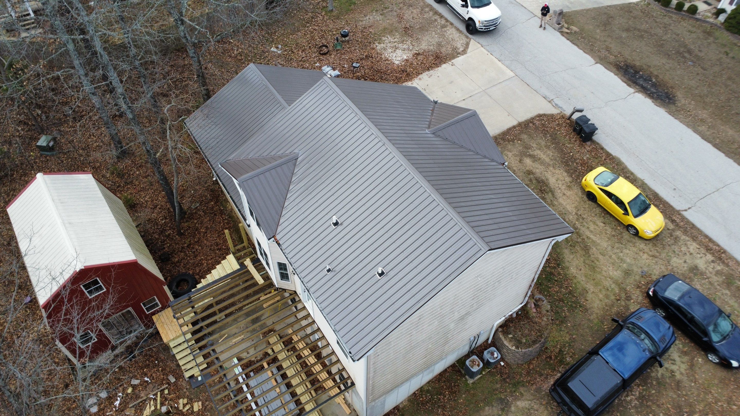 Residential Roofing Install - 29 Gauge G-Rib Metal - Color Burnished Slate  by Titan Commercial & Residential Roofing 
