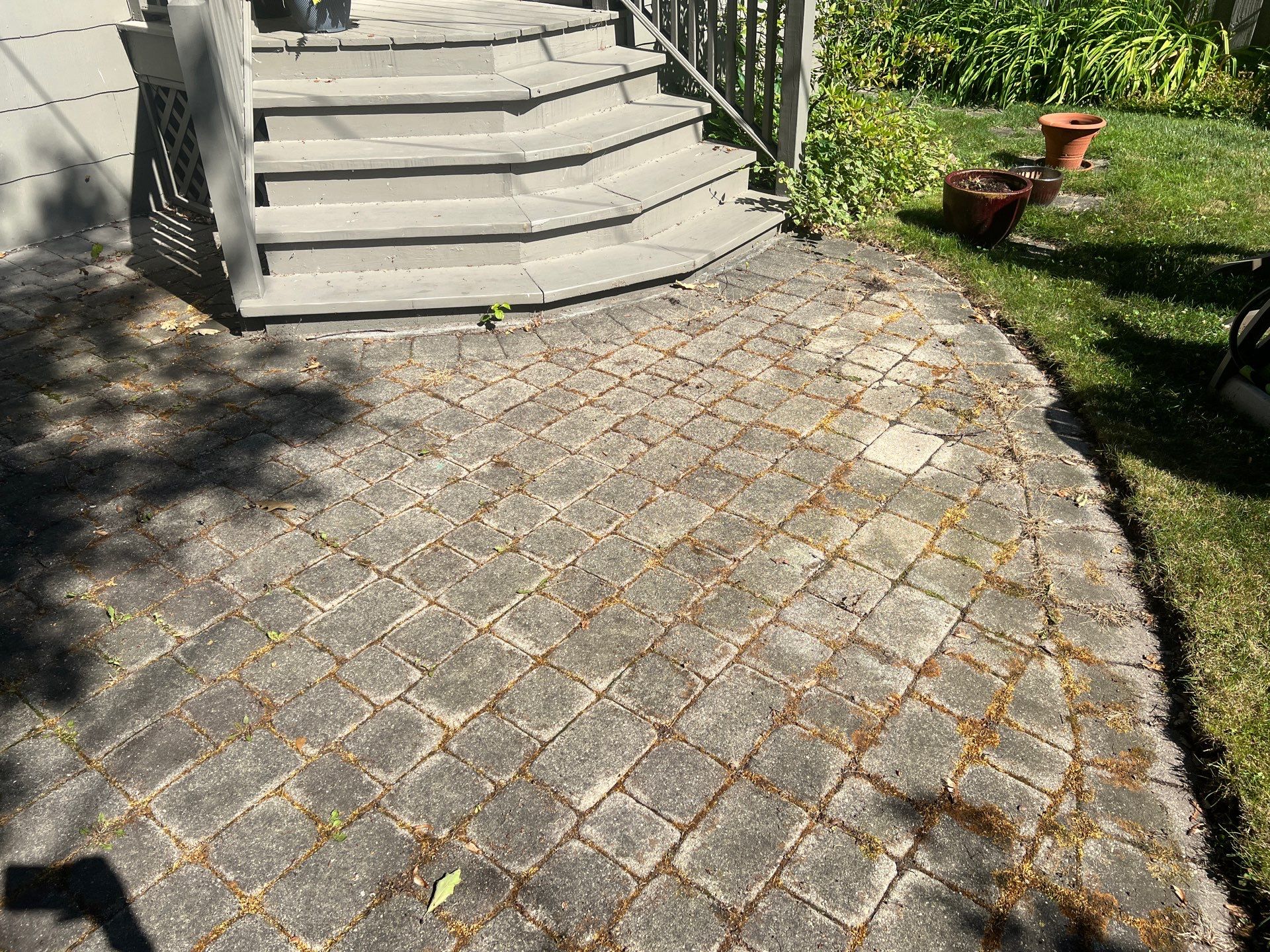 Brick paver cleaning and sealing by Northern Power Washing LLC.