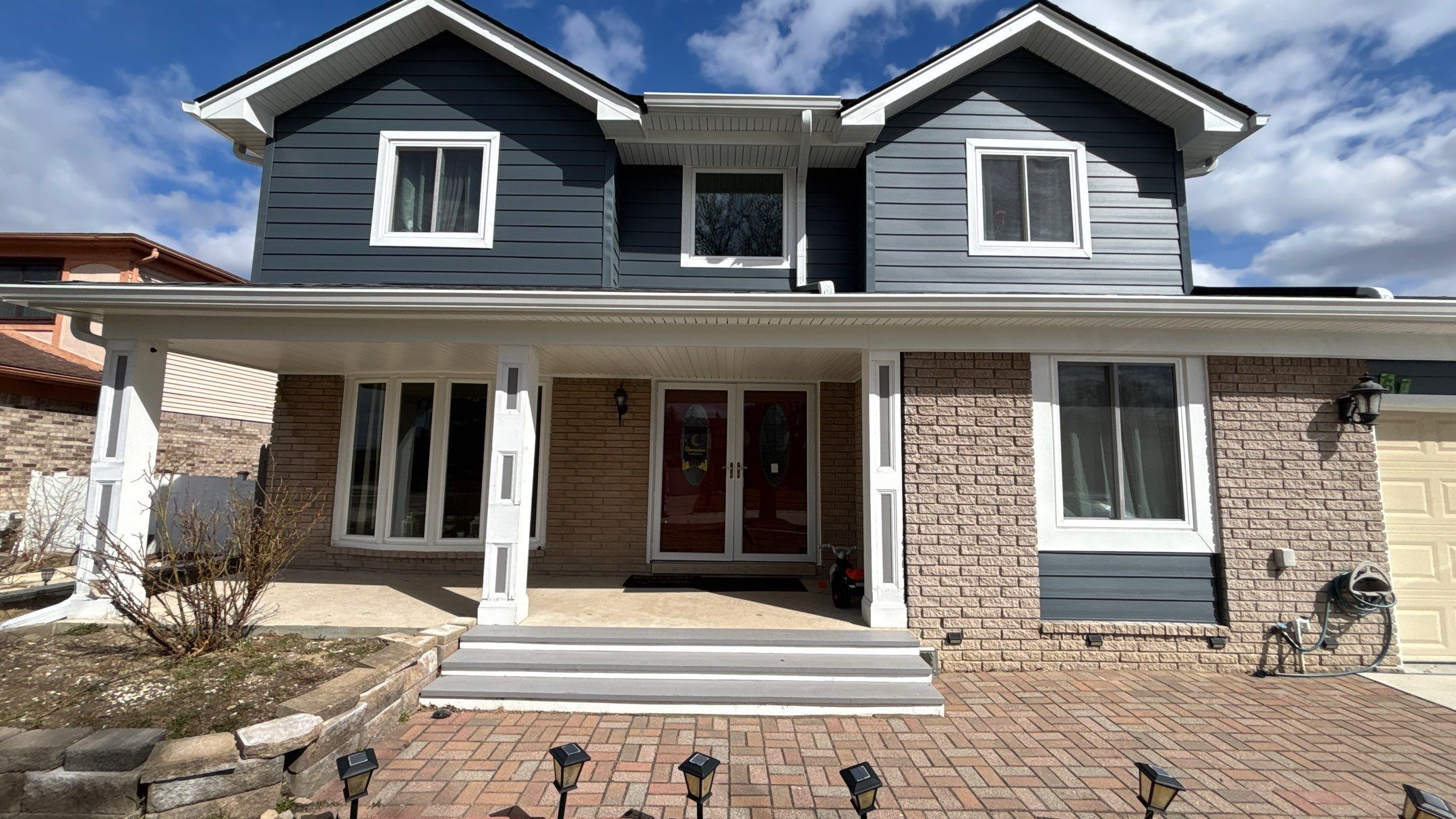 Siding Replacement using Alside Midnight Blue by 180 Contractors