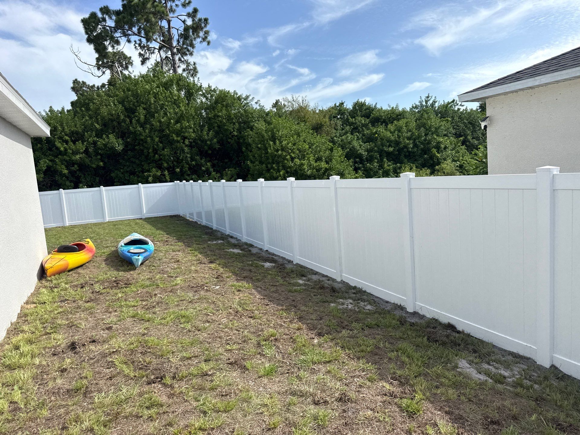 White Vinyl Privacy Fence and Gate Installation in Port Charlotte by True Fence LLC