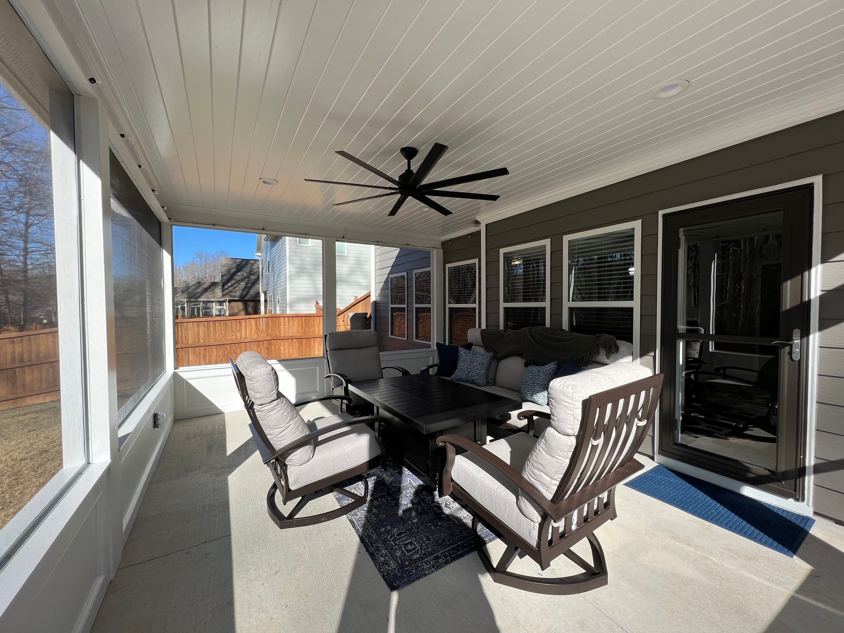 Screened-In Porch Construction With White Beadboard Ceiling In Cumming by Swift Home Renovations 