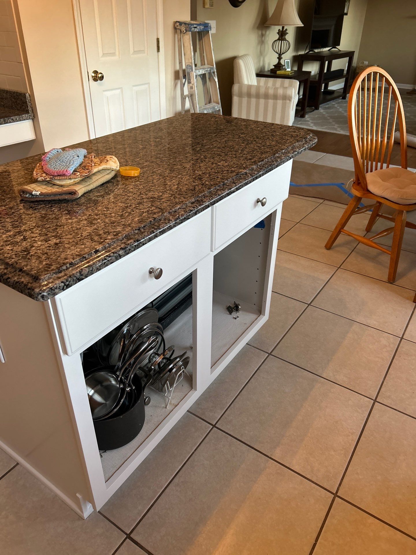 Cabinet painting by GonzalezPainters & Contractors Inc 