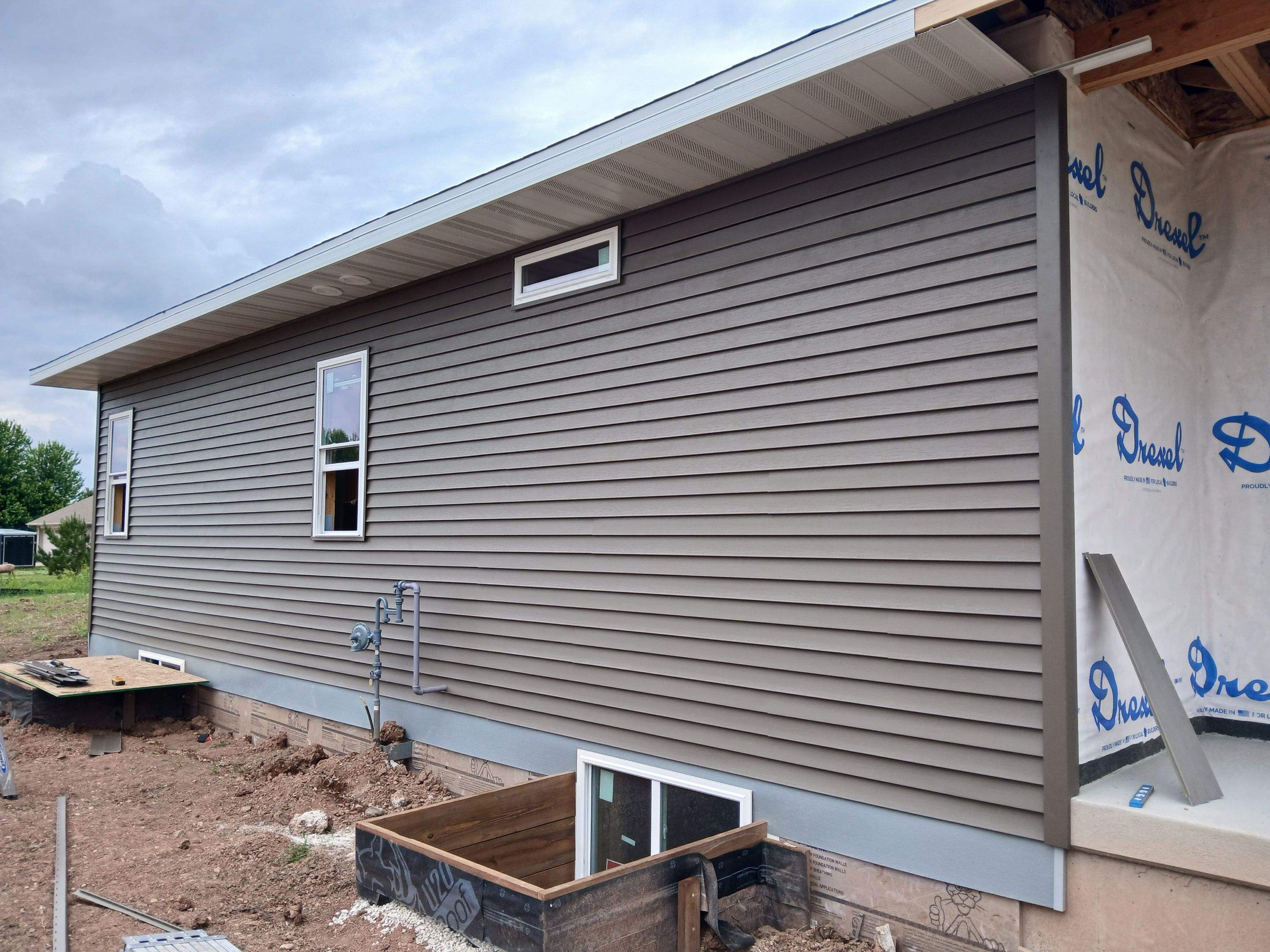 New Con Siding  by Gellings Roofing & Siding