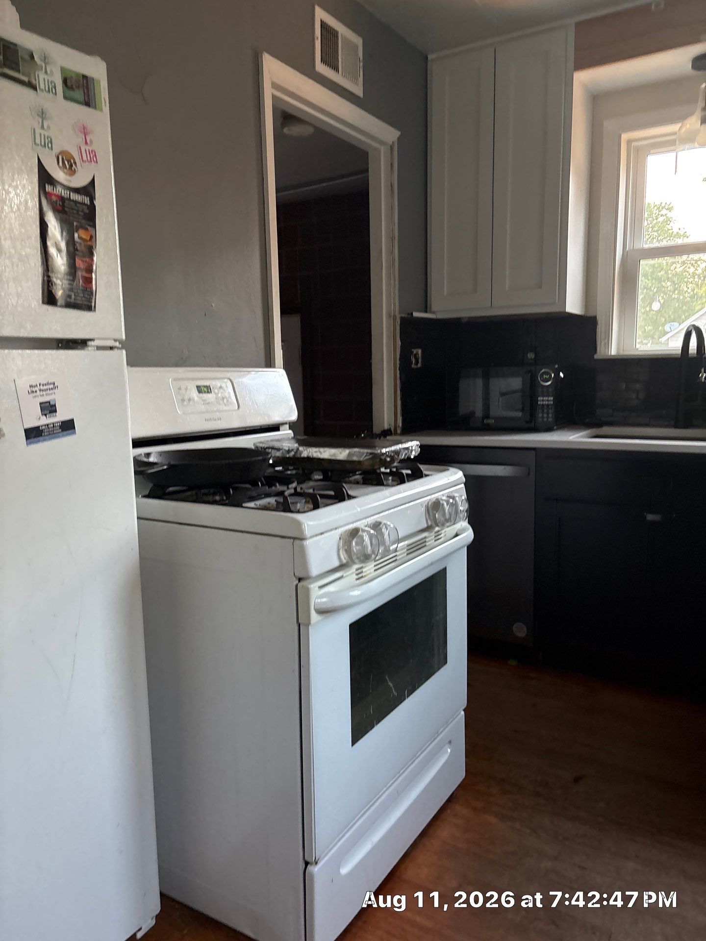 Two-Tone Kitchen Remodel with Black Subway Tile in Lincoln by CompanyCam Sales Demo