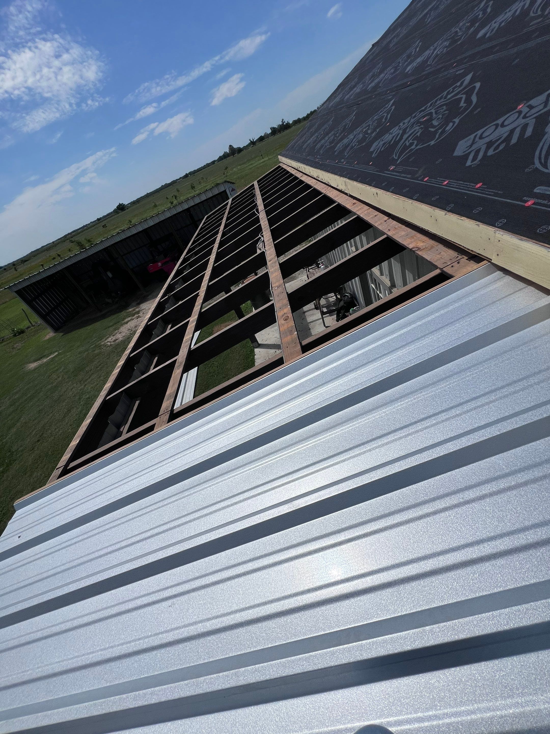 Residential Roofing Installation using Metal by Roof Repair Company