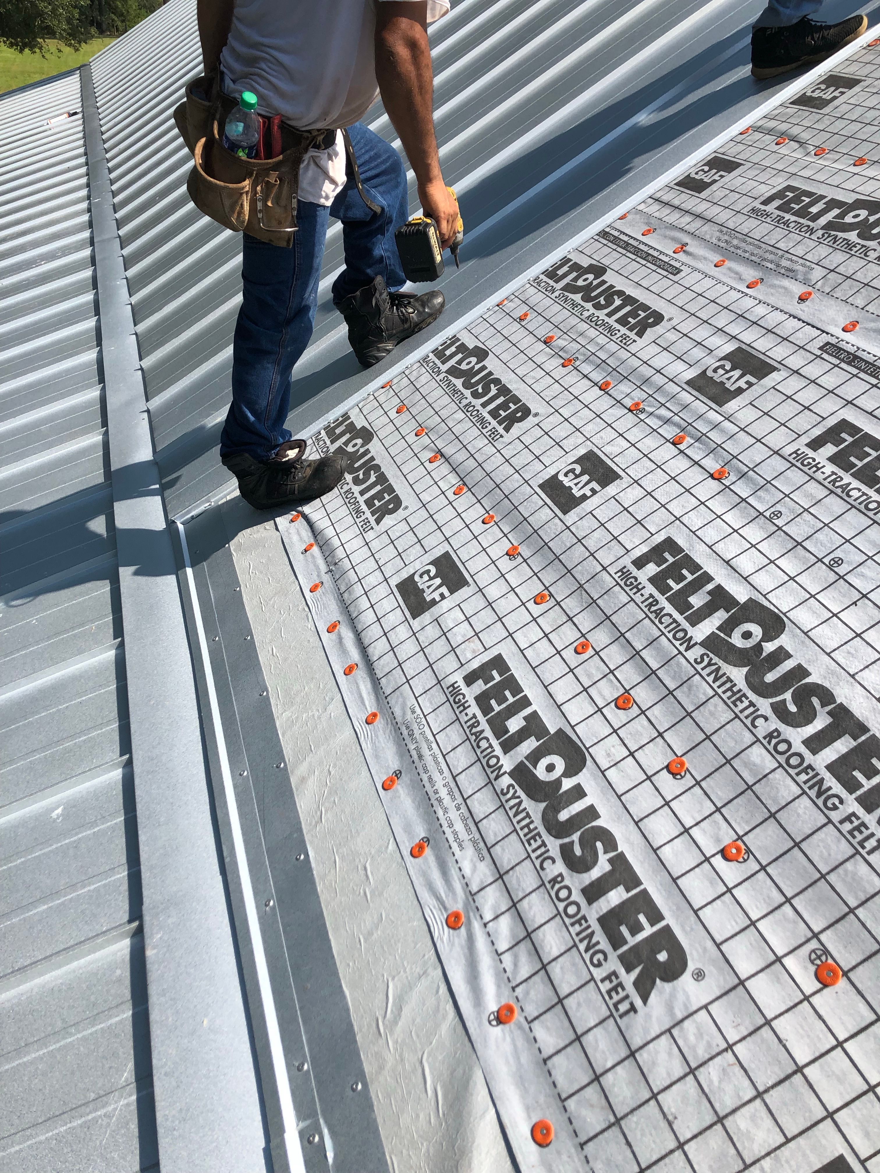 Residential Roofing Installation using Metal roofing by American Roofing & Construction LLC