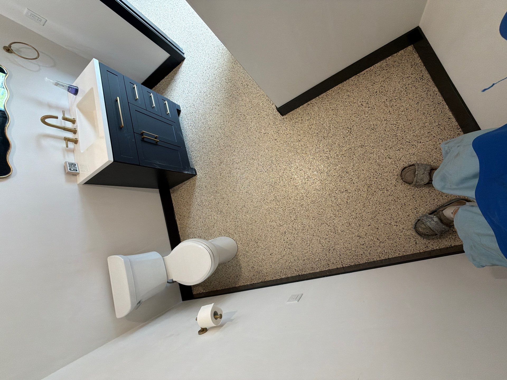 Multi-Room Epoxy Flake Floor Installation Throughout Pentwater Residence by Gordon Painting