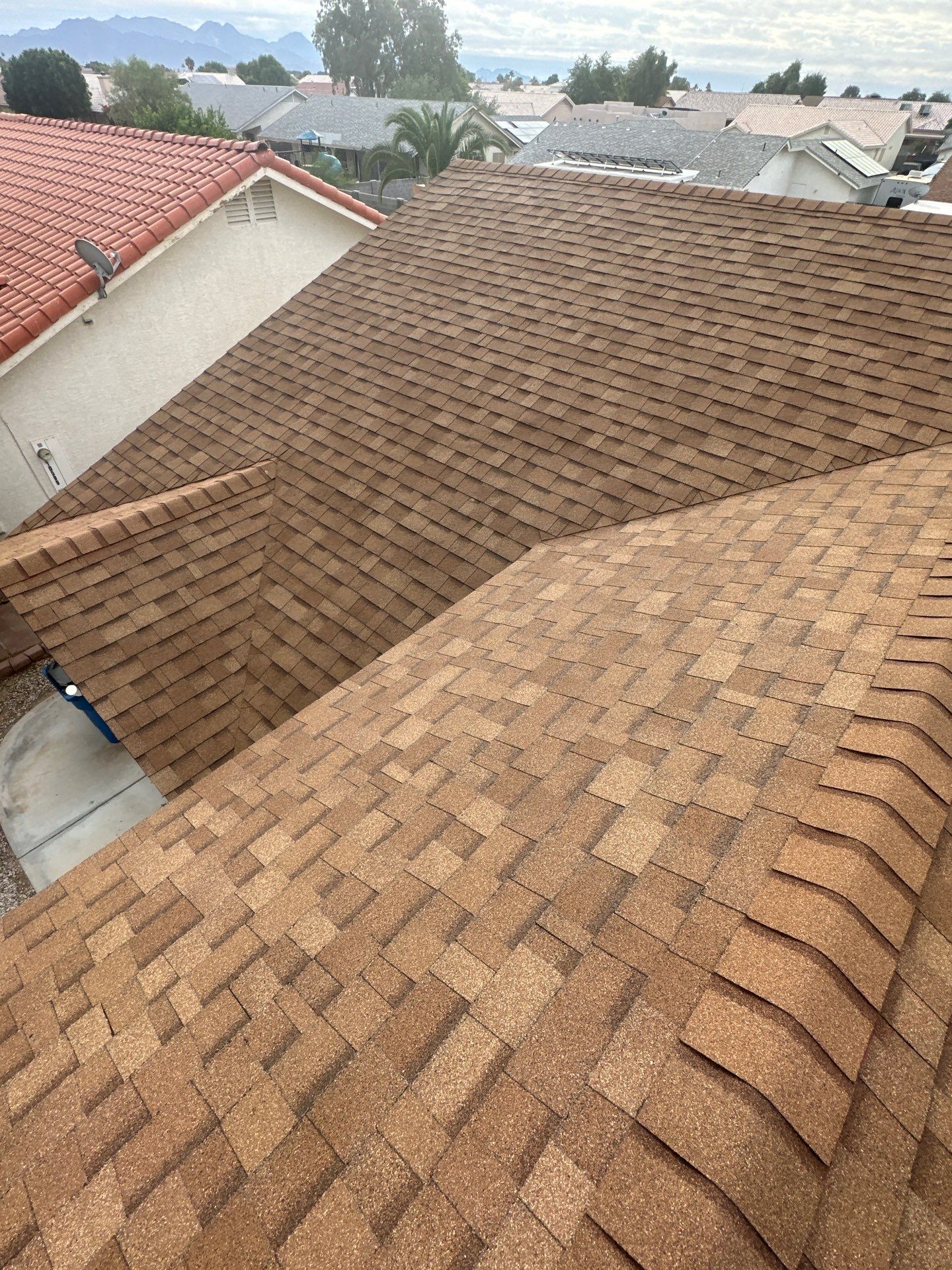 Desert Tan Shingles by Reimagine Roofing