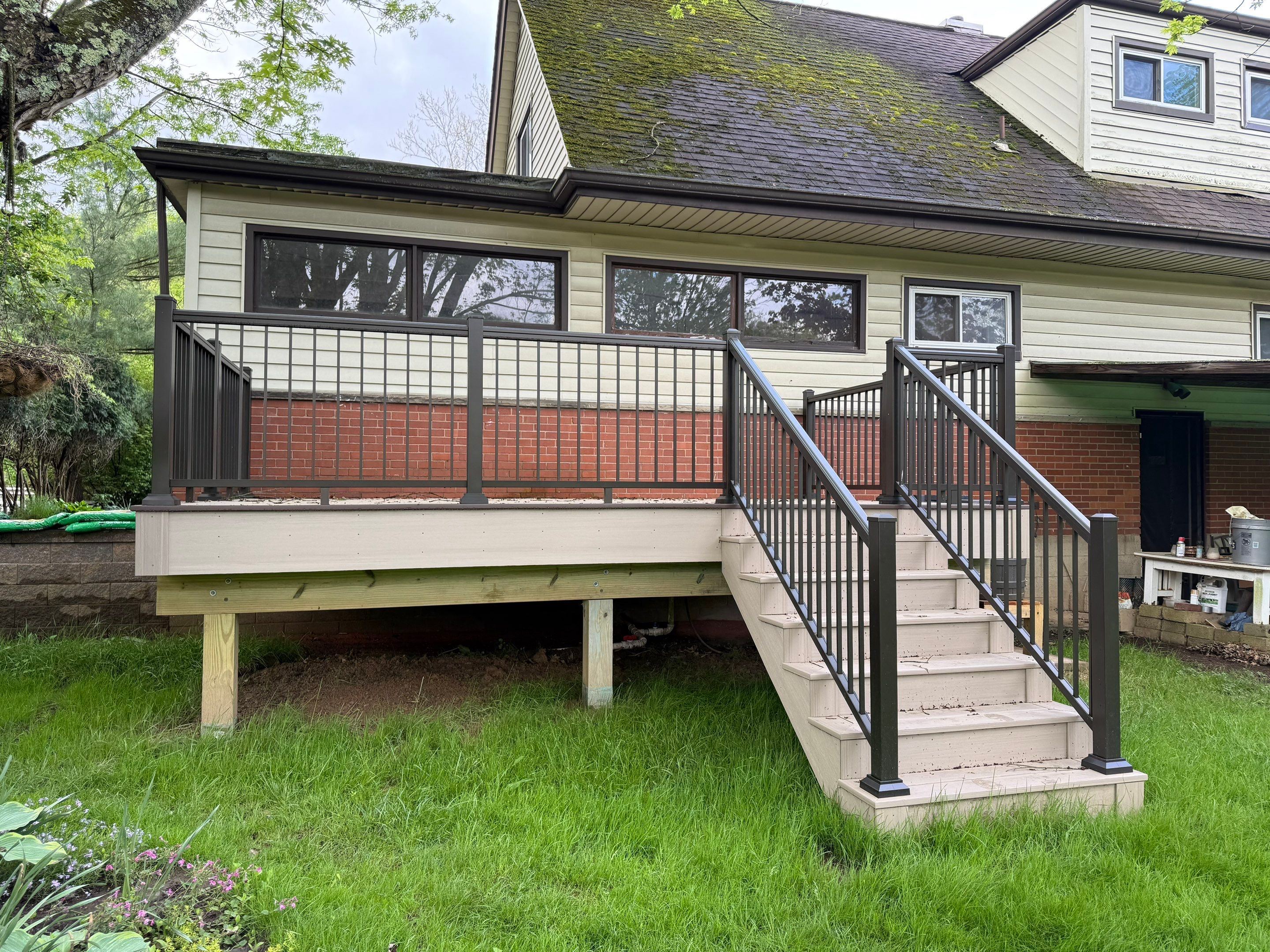 Deck and door install by Cousins Roofing Siding & Decks