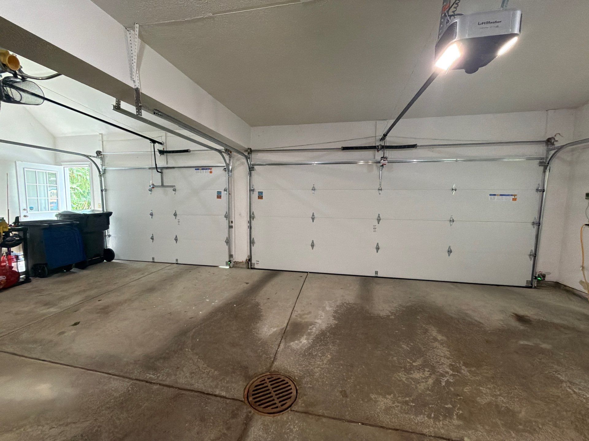 White Raised Panel Sectional Garage Door Installation in Solon by Ohio Garage Door Repair