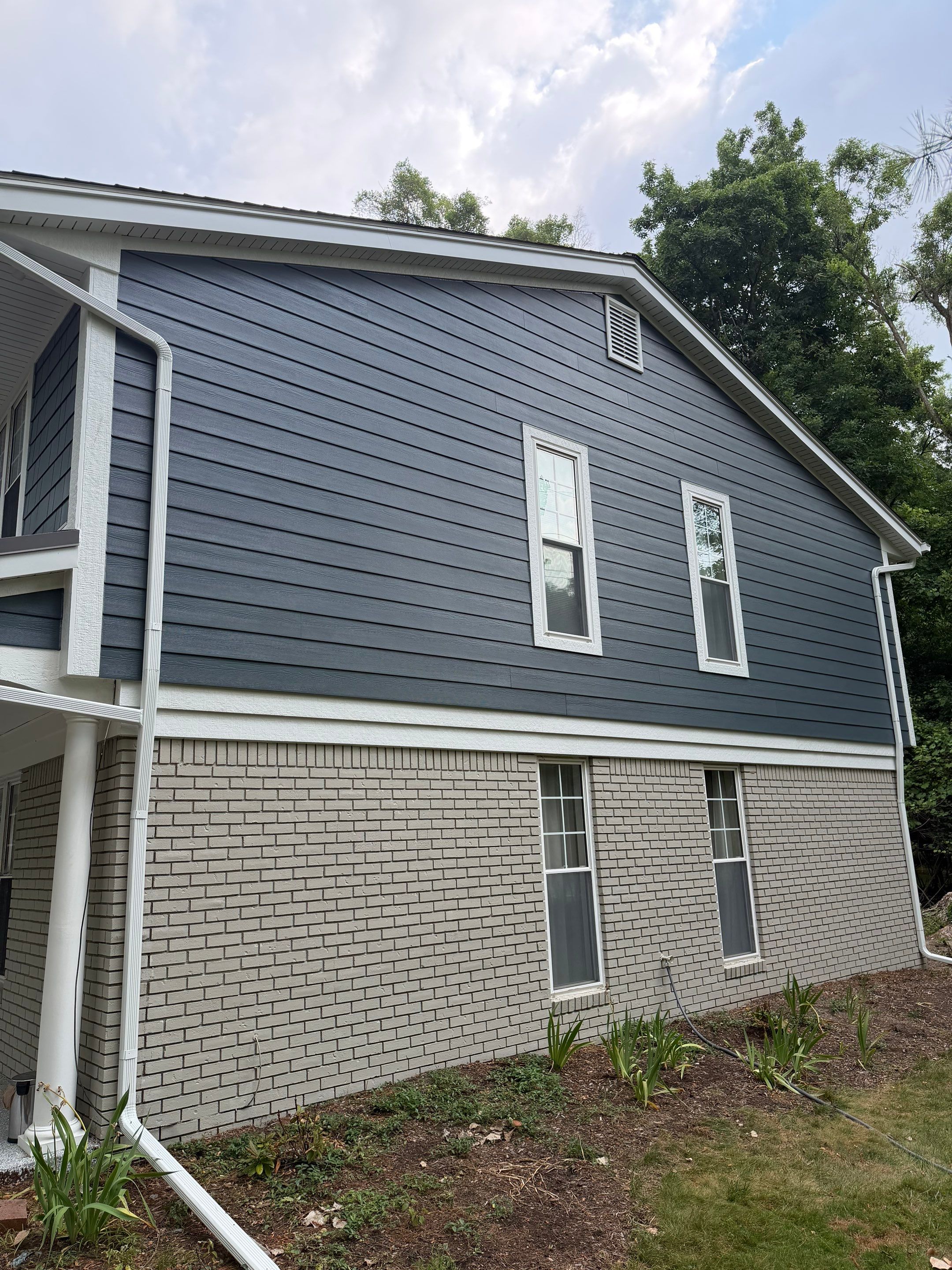 James Hardie Siding Replacement & Metal Roof by Bloomfield Construction & Restoration