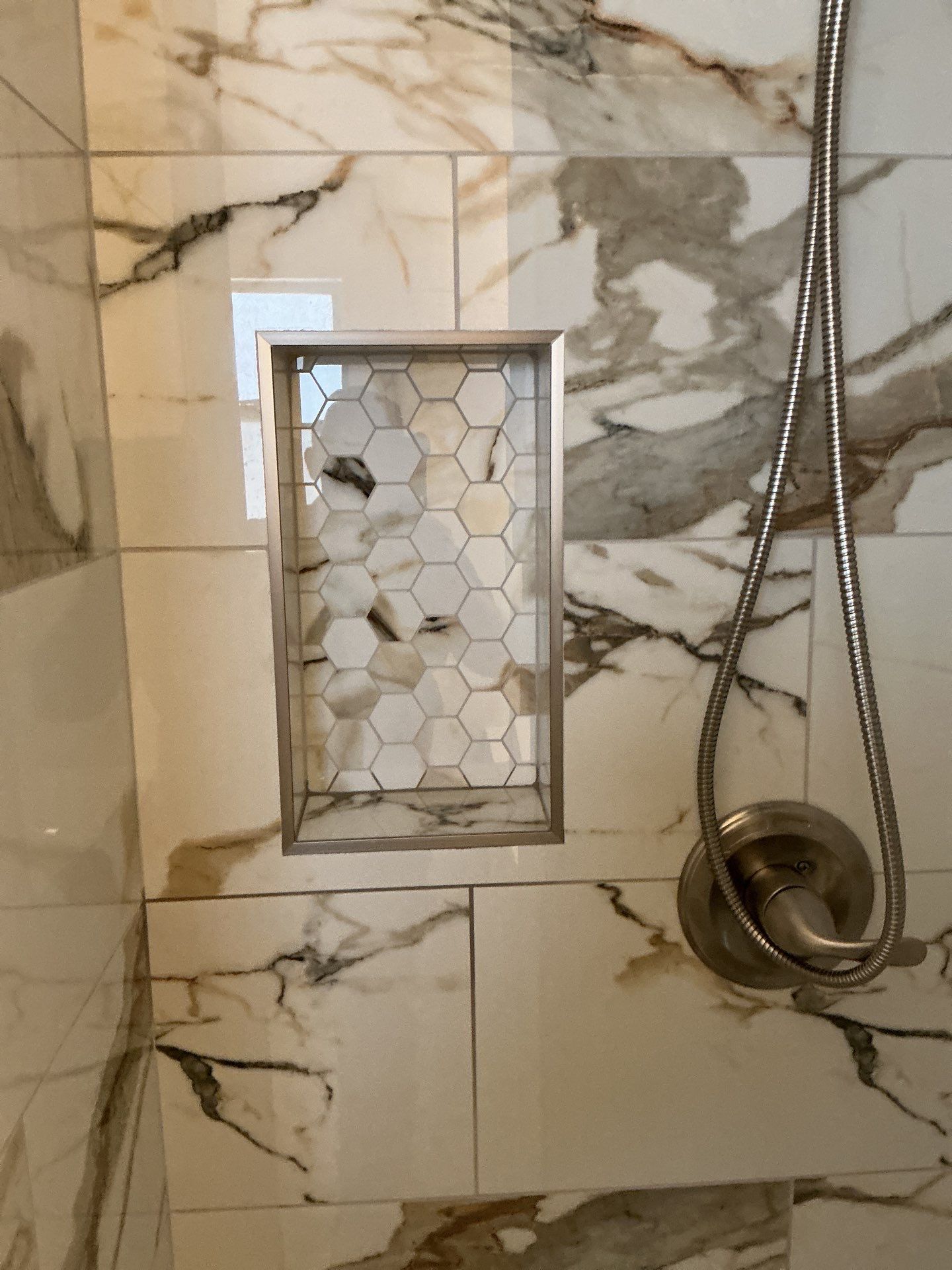Modern Bathroom Remodel Featuring Marble Tile in Ormond Beach by Acies Renovations