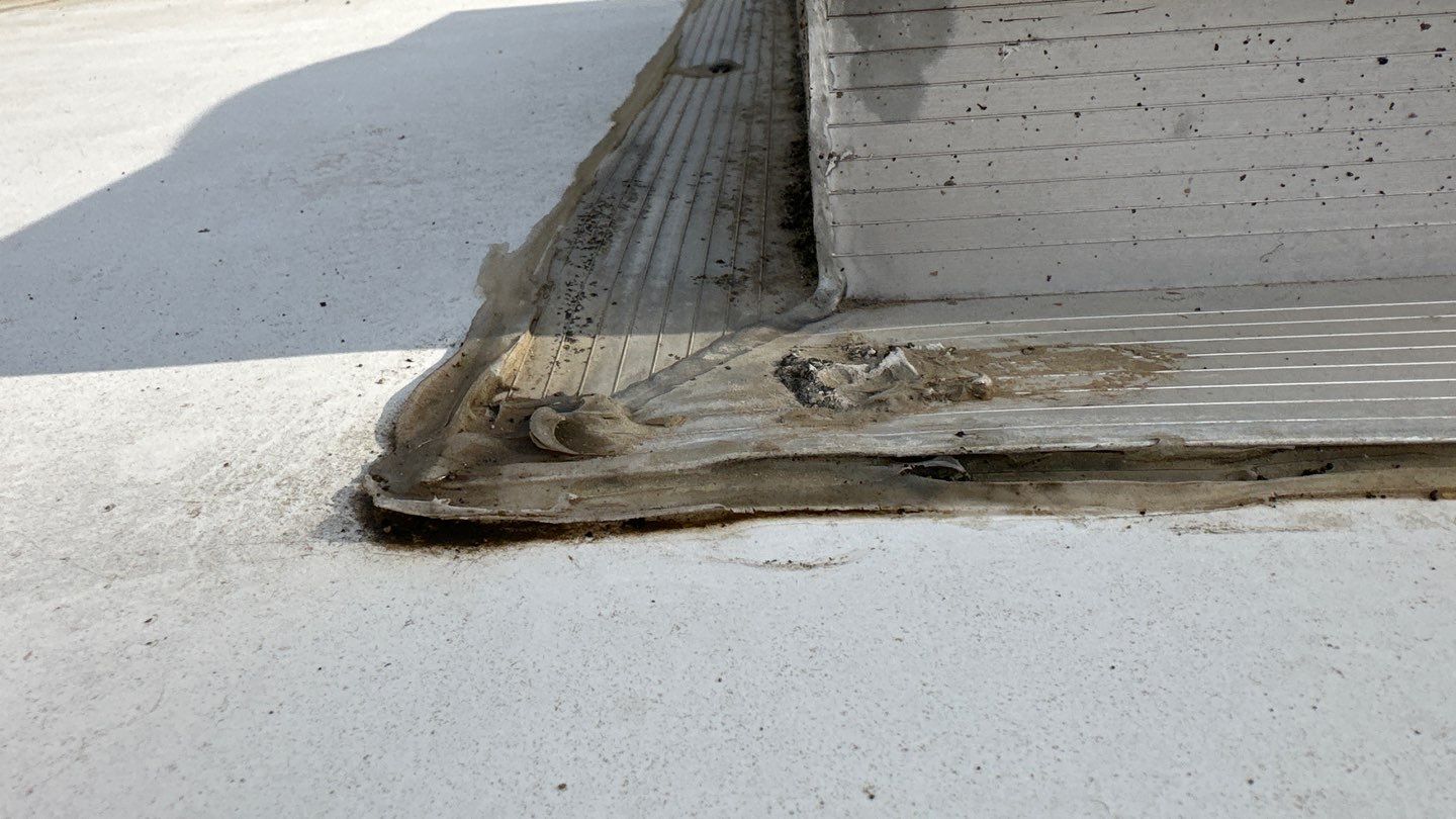 Single-ply roofing system on porch using TPO 60 mil by Straight Edge Roofing Inc