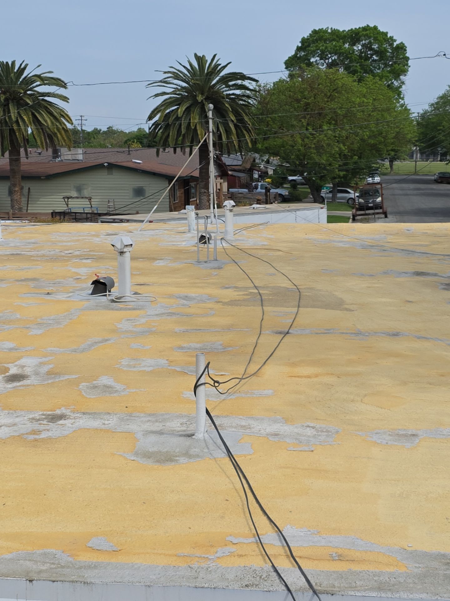 Foam Refurbish using Conklin Benchmark/PUMA XL coatings and spray foam by Straight Edge Roofing Inc