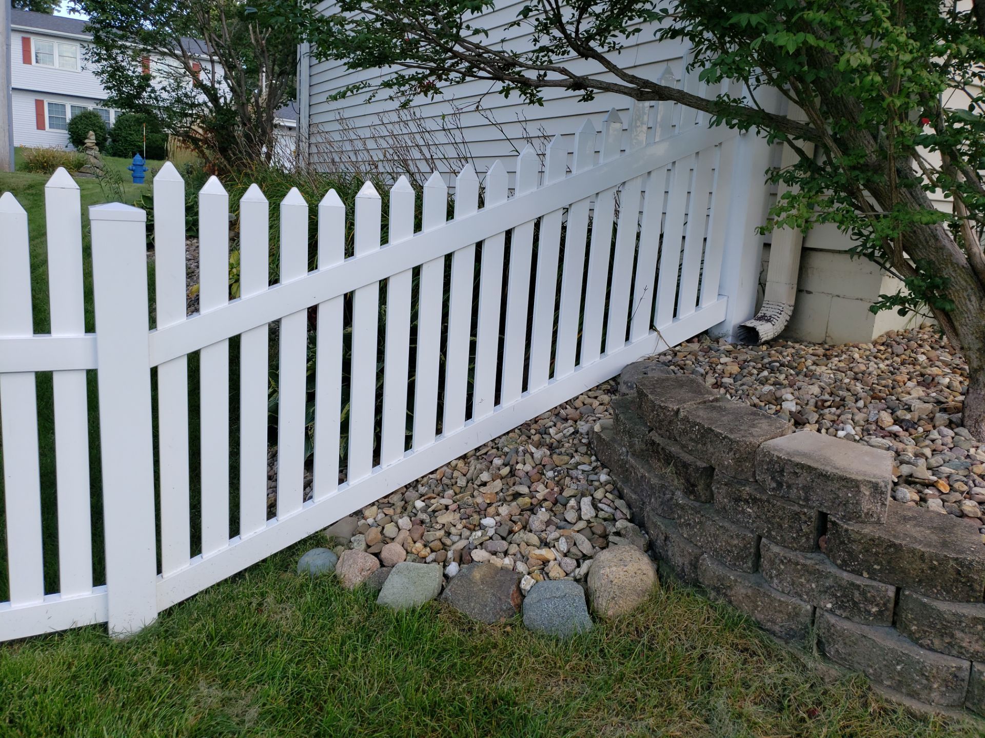 White Vinyl Spaced Picket Fence Installation in Waterloo by Perfect Picket Fence and Stain