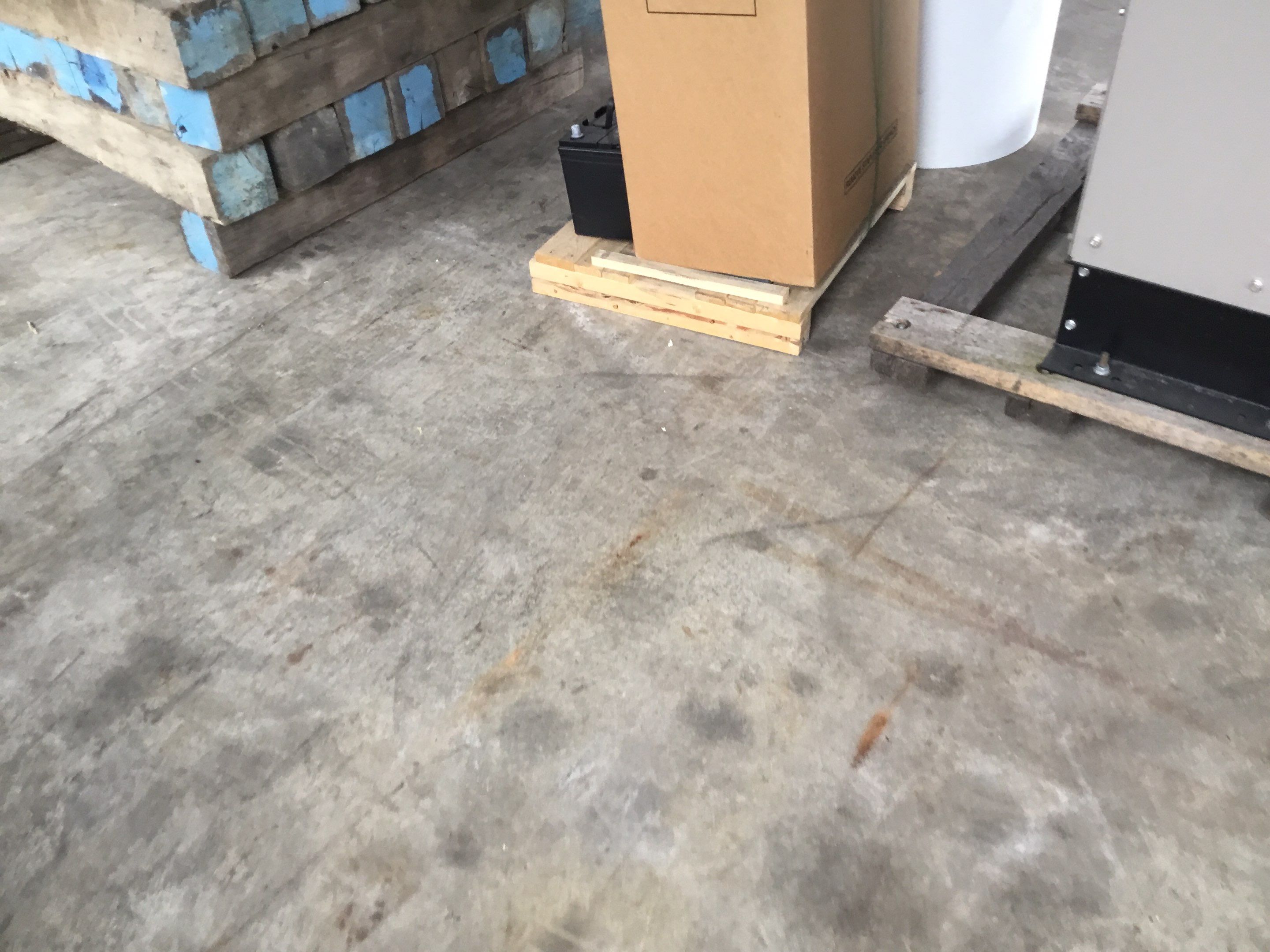 Quinn Bros Commercial TransFLOORmation by Symphony Concrete Coatings