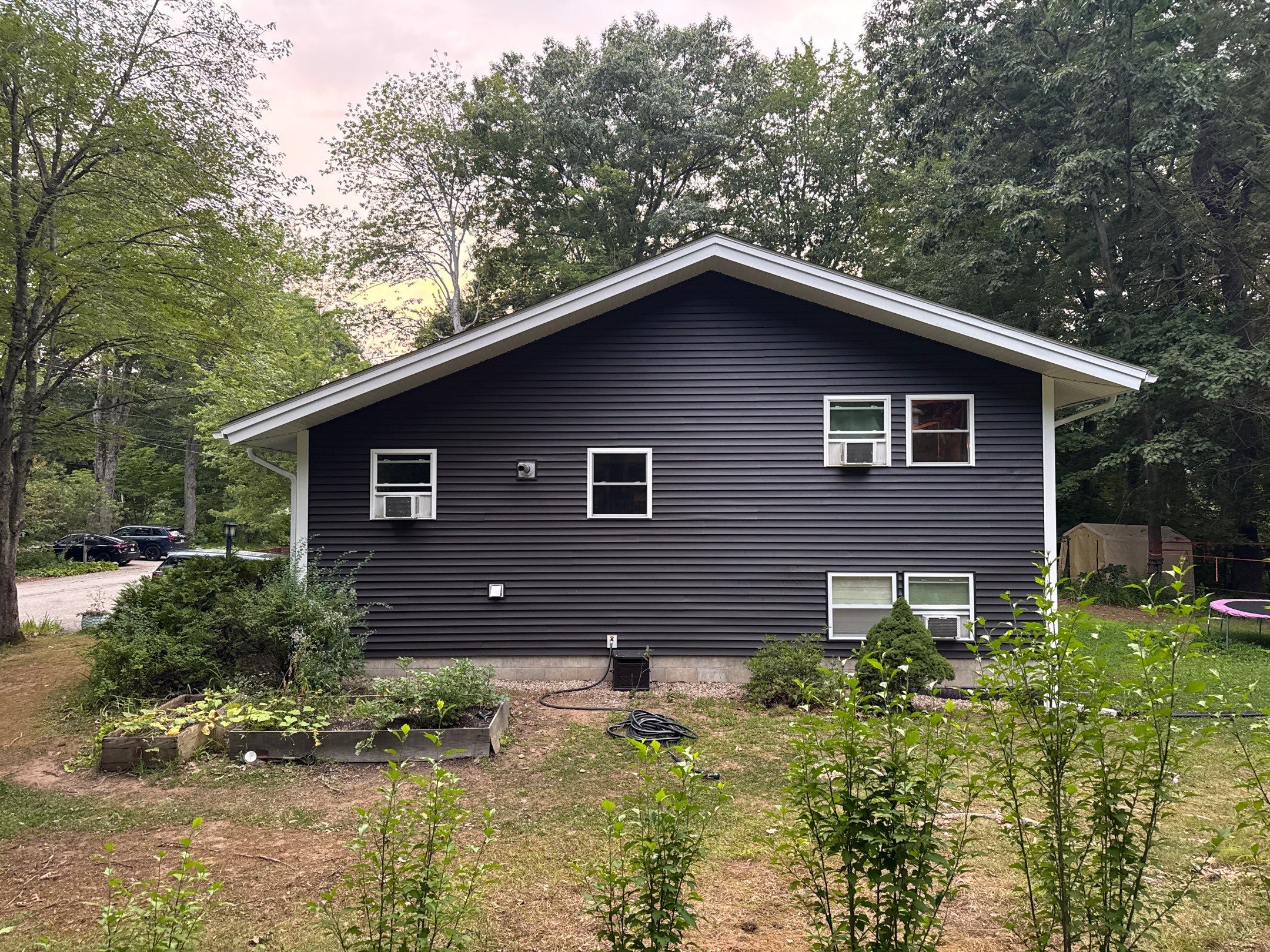 Full Vinyl Siding, Window & Door Replacement Near the Bellamy River in Dover, NH by Compass exteriors