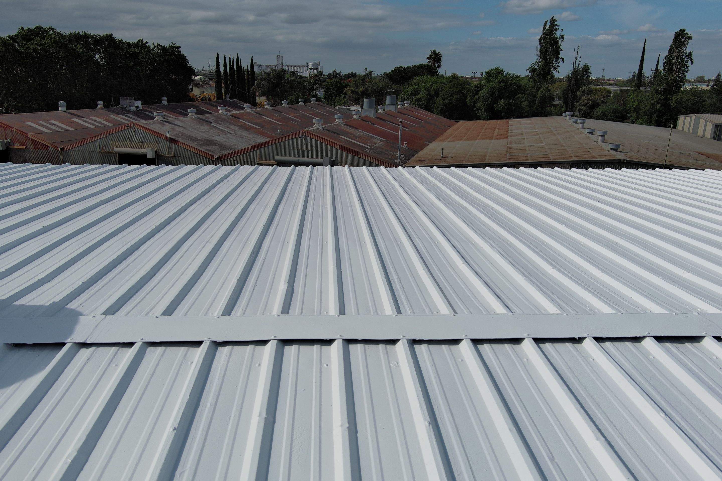 MR Roofing system using Conklin BenchPly system with PUMA top coat by Straight Edge Roofing Inc