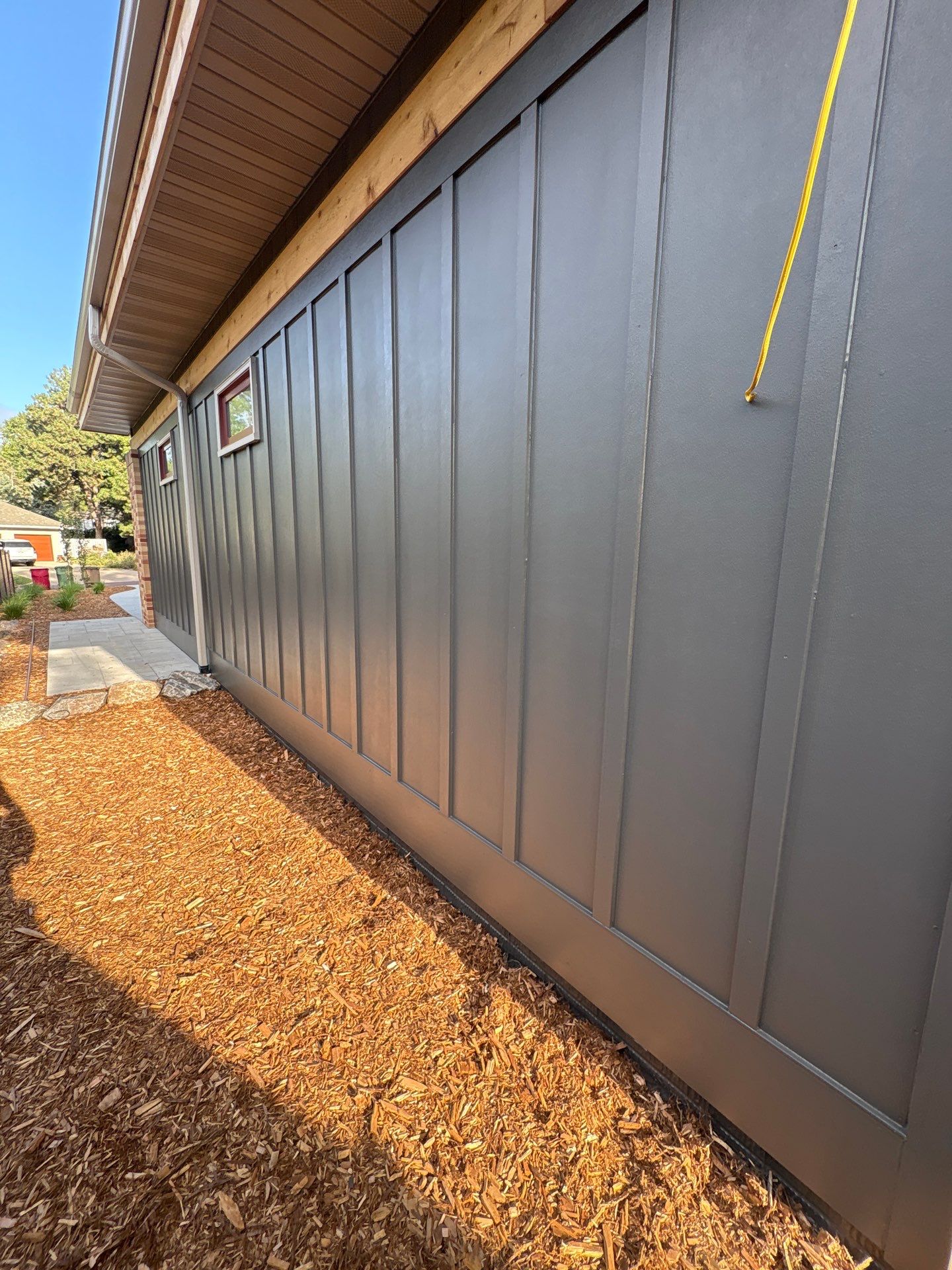 Exterior Siding and Brick Painting for Sioux Falls Garage by Select Painting, Coatings & Garage Cabinets