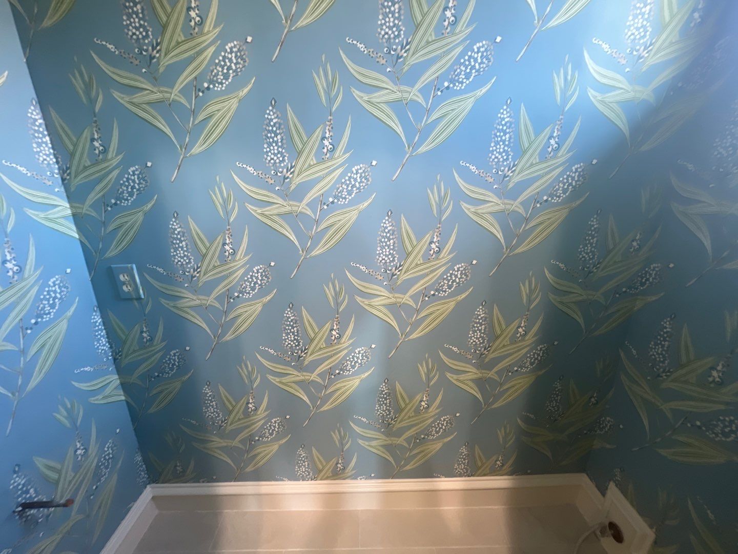 Wallpaper Installation in the Bathroom by Nomad Painting