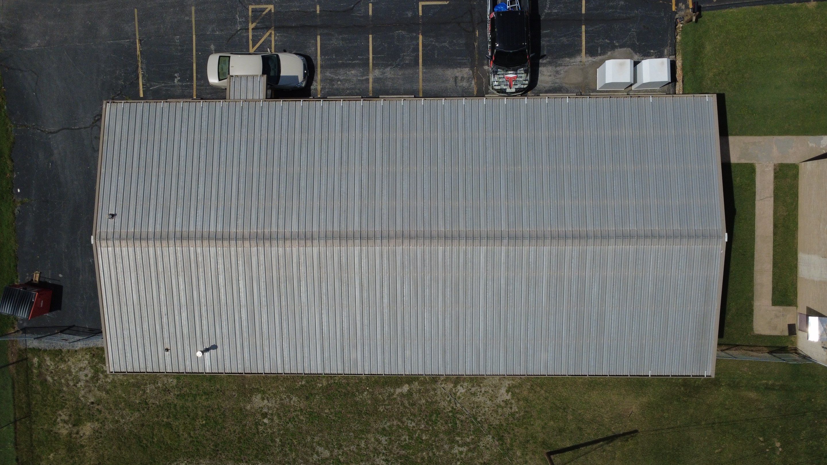 Commercial Roofing Install - Metal Coatings Restoration System  - Color White  by Titan Commercial & Residential Roofing 