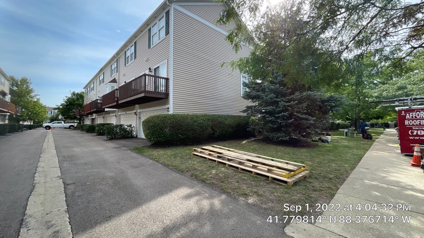 Court Yards of Orchard Valley Building 2411 by Affordable Roofing of America Inc.