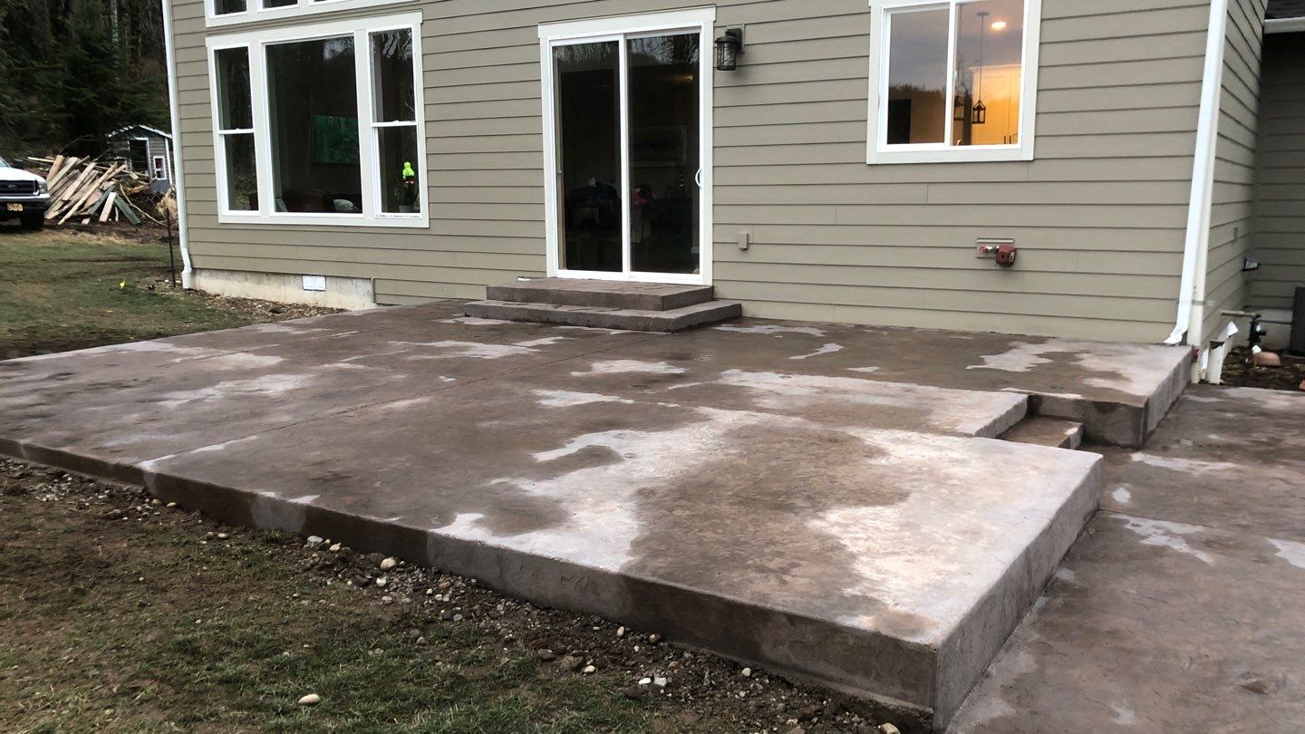 Mandy | Stamped Concrete Patio & Driveway by Jireh Asphalt & Concrete Inc 