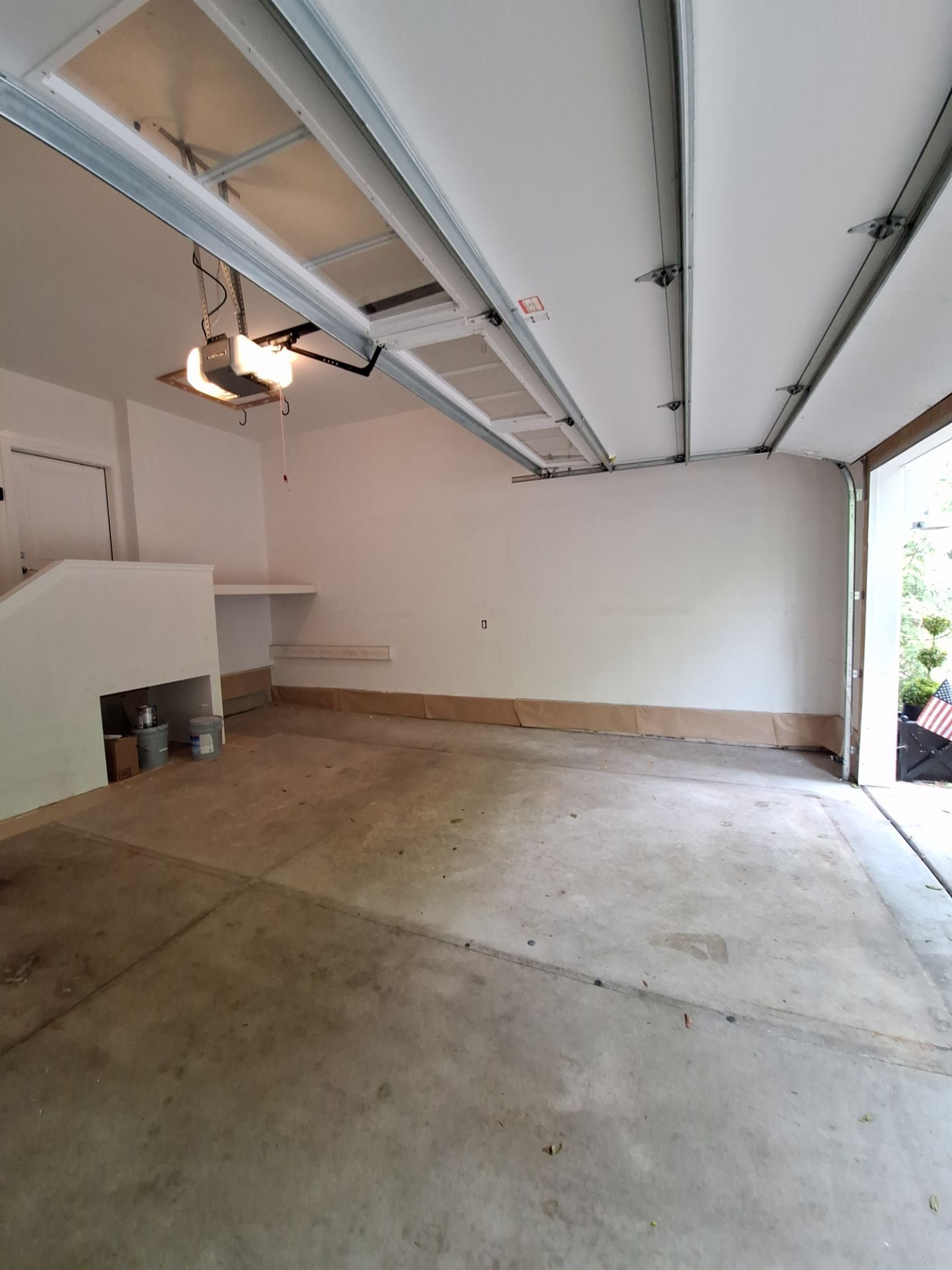Garage Transformation in West Michigan | Full Interior Repaint & Epoxy Flake Floor in Tidal Wave Blend by Gordon Painting