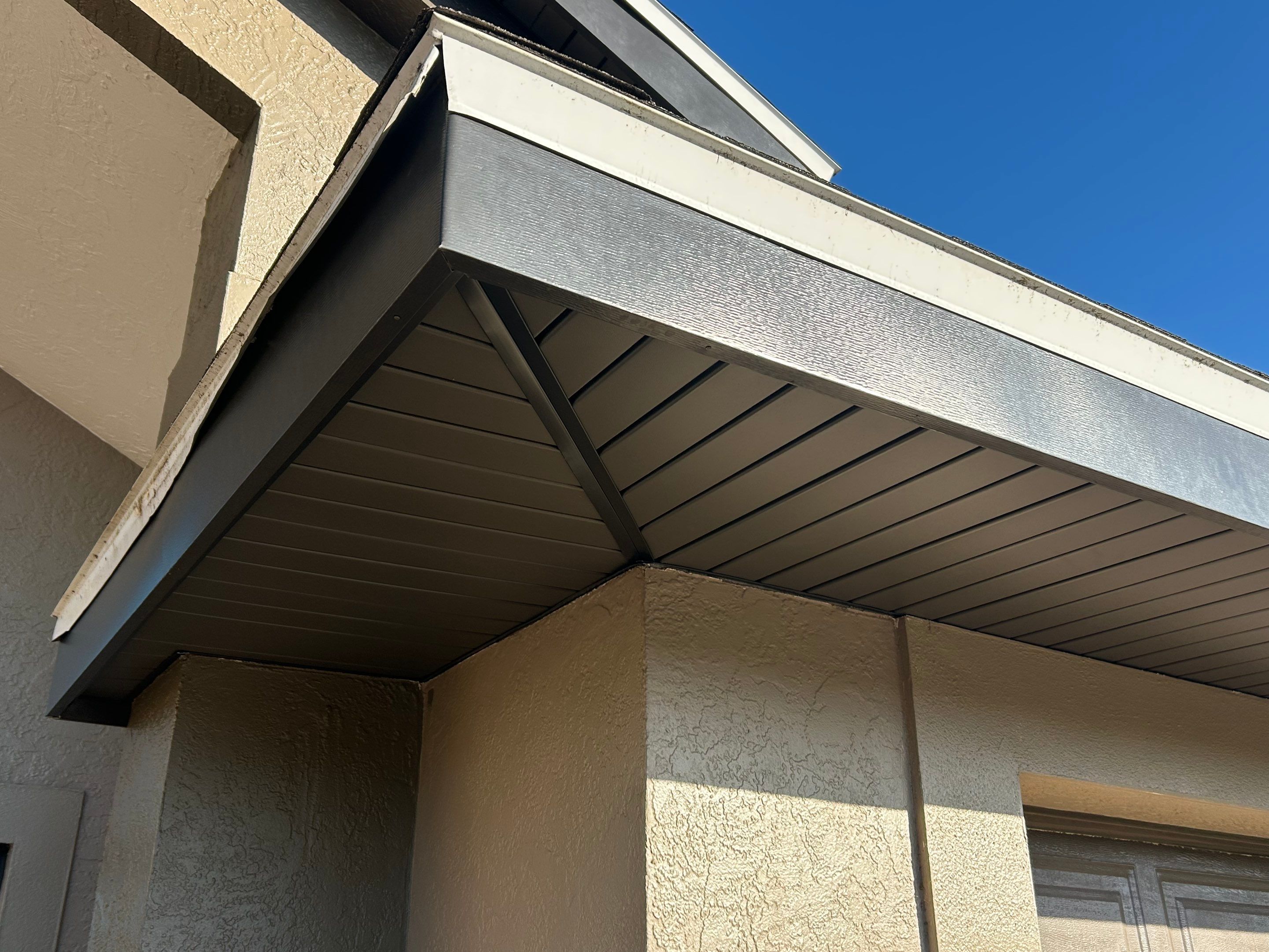 Black Seamless Gutters in Sarasota FL by Gutter Professors