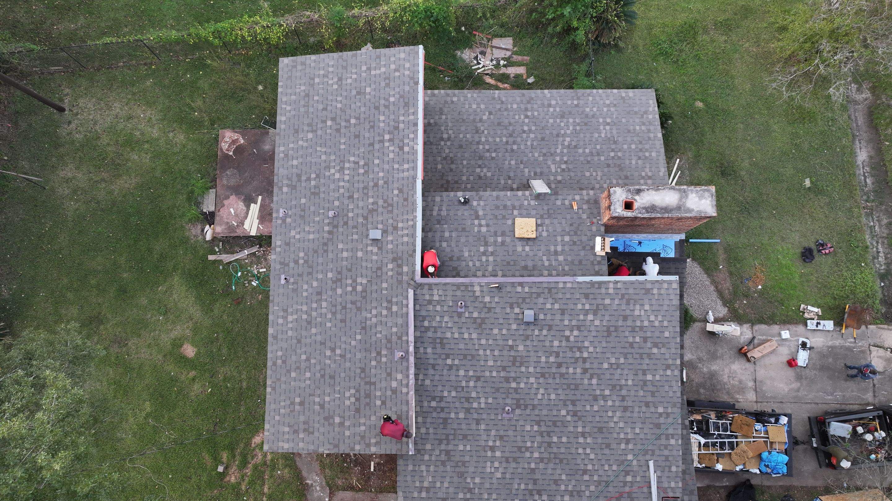 Roof Replacement with Chimney Flashing Detail — Houston, TX by PL Roofing & SB Roofing, LLC.
