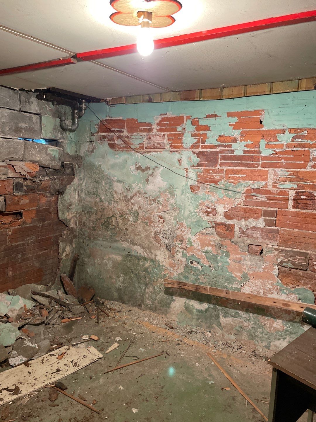 Wall repair with Fortress Invisibeams by ACE Waterproofing & Basement Solutions