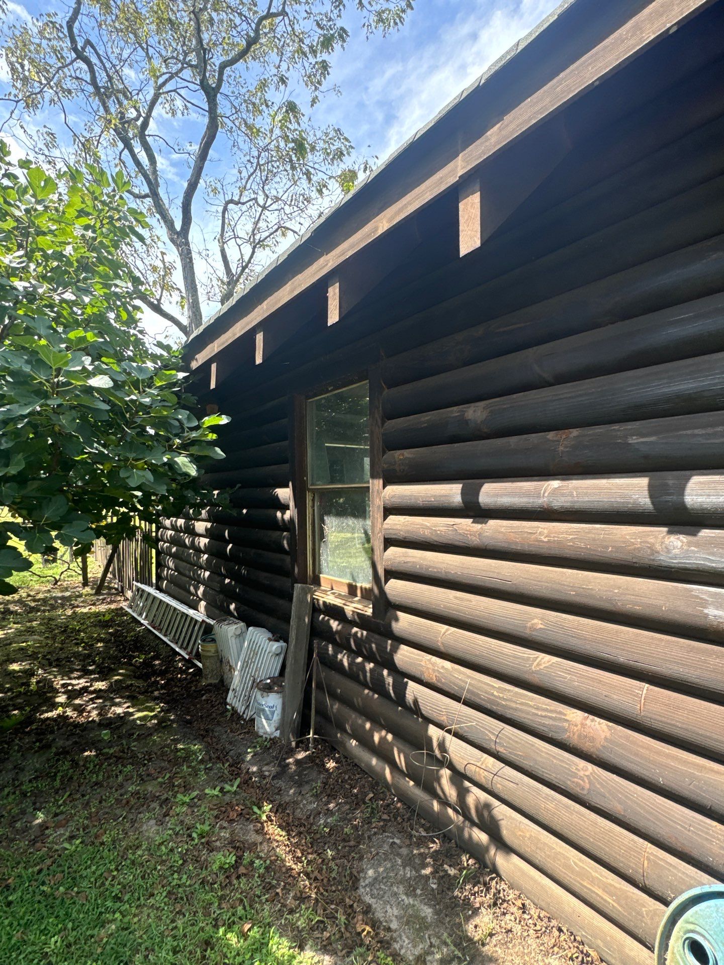 Smithfield Log Cabin by AKK Painting LLC