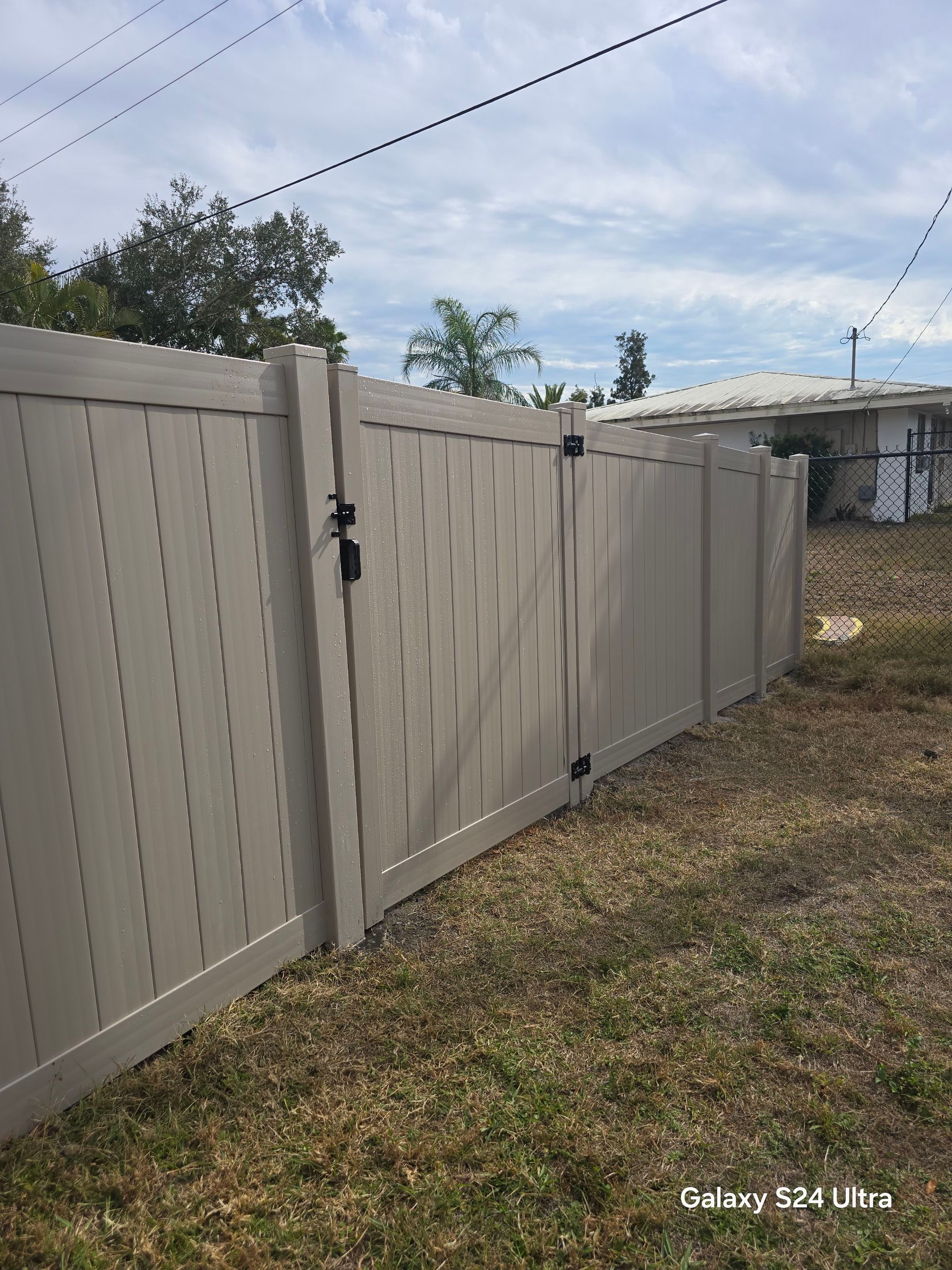 Custom Color Vinyl Fence in North Port by True Fence LLC