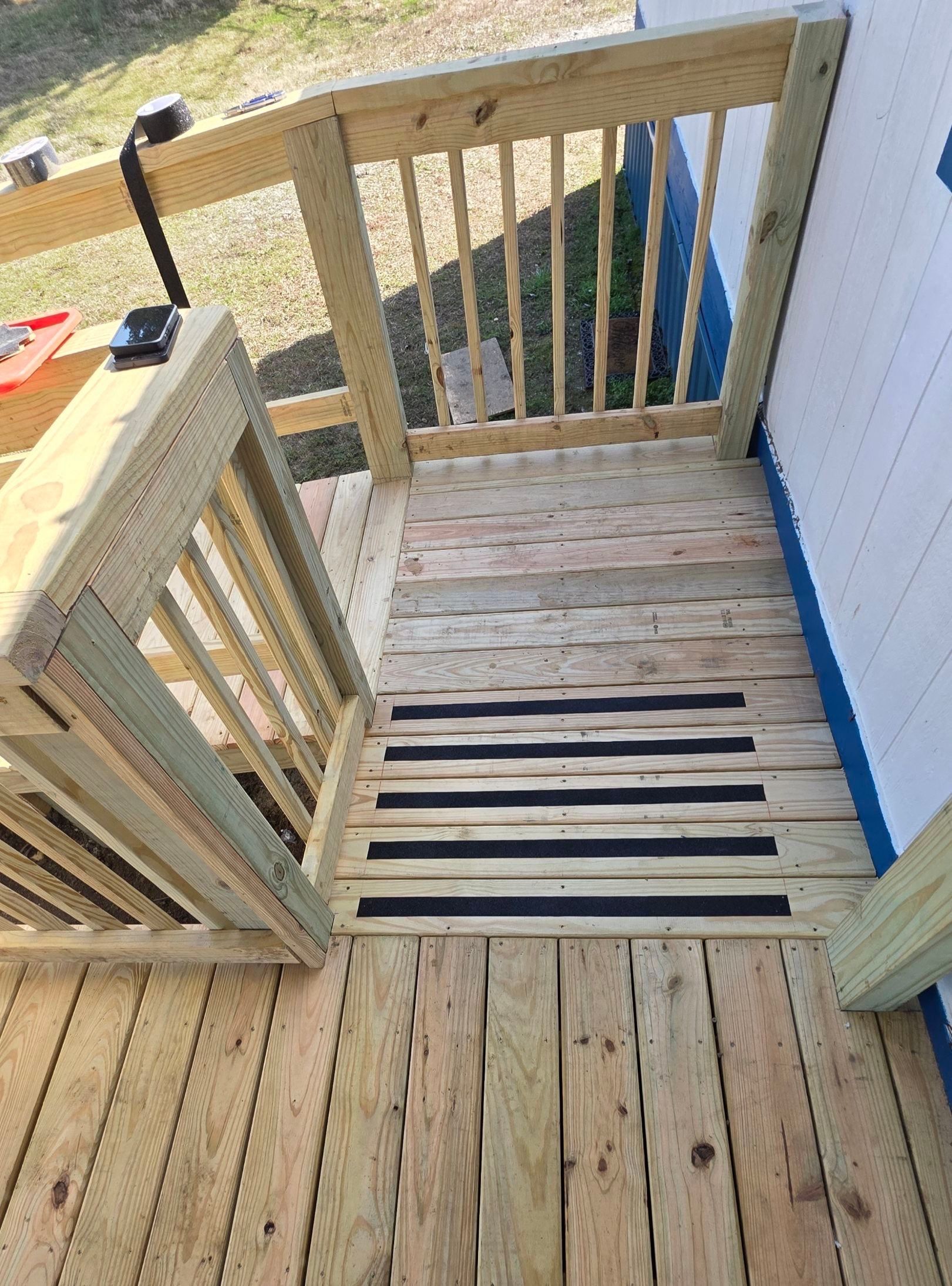 Covered Deck w/ ADA Ramp by In & Out Construction & Remodeling, LLC