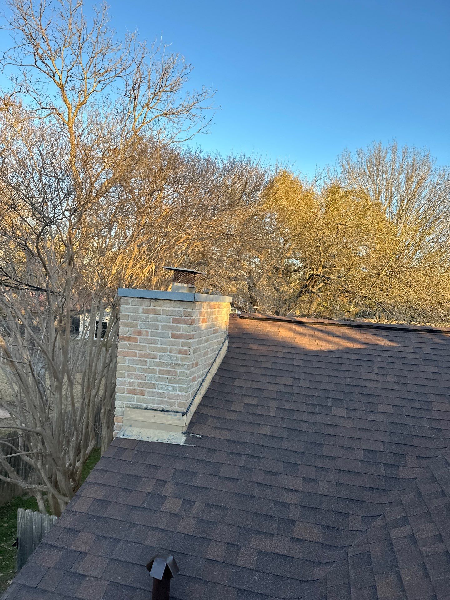 Residential Roofing Installation using Owens Corning Oakridge Brownwood by DeZign Roofing & Exteriors