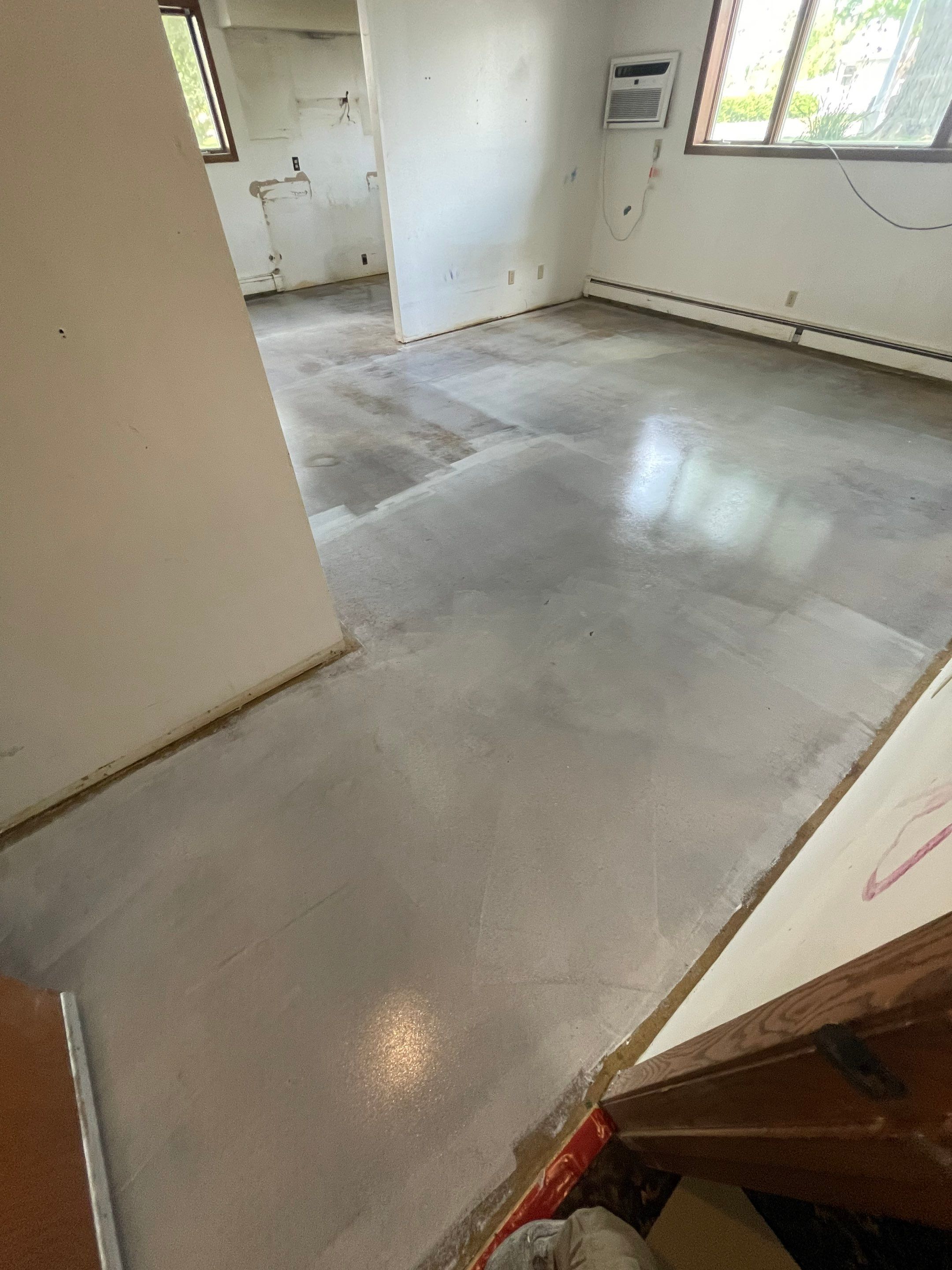 Commercial Subfloor Preparation and Flooring Restoration in Sioux Falls by Select Painting, Coatings & Garage Cabinets