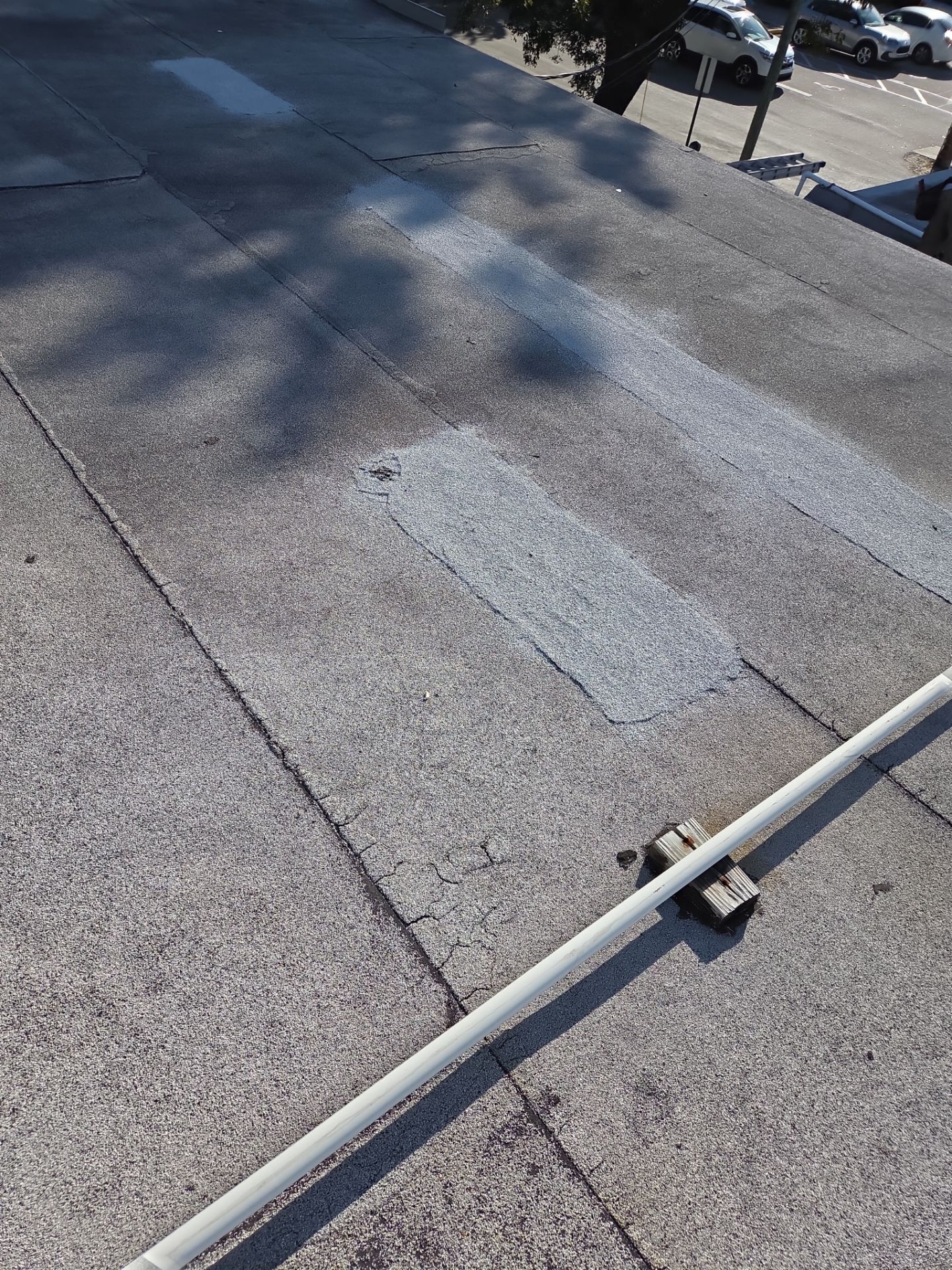 Commercial Flat Roof Restoration Using Silicone Coating in Hallandale Beach by Aastro Roofing