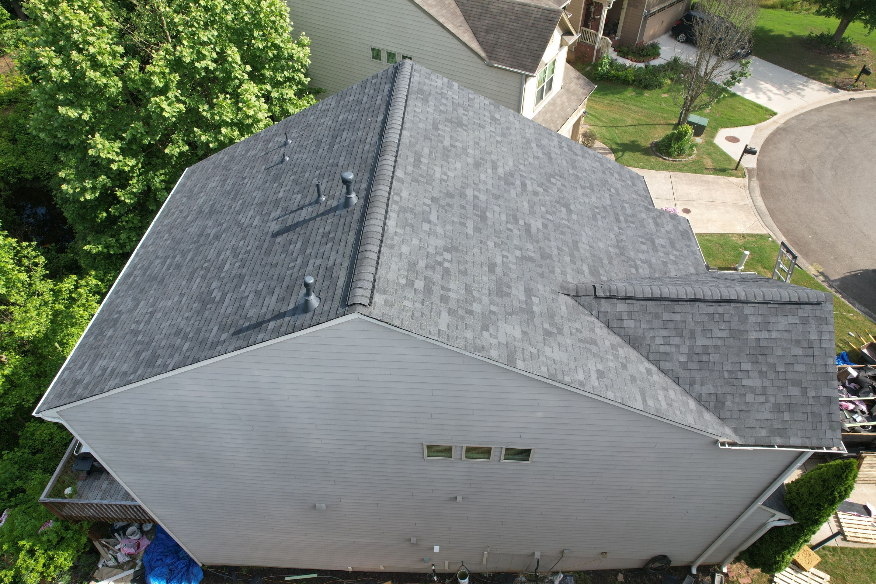 Residential Roof Replacement using Owens Corning Trudef Twilight Black by Inspector Roofing and Restoration