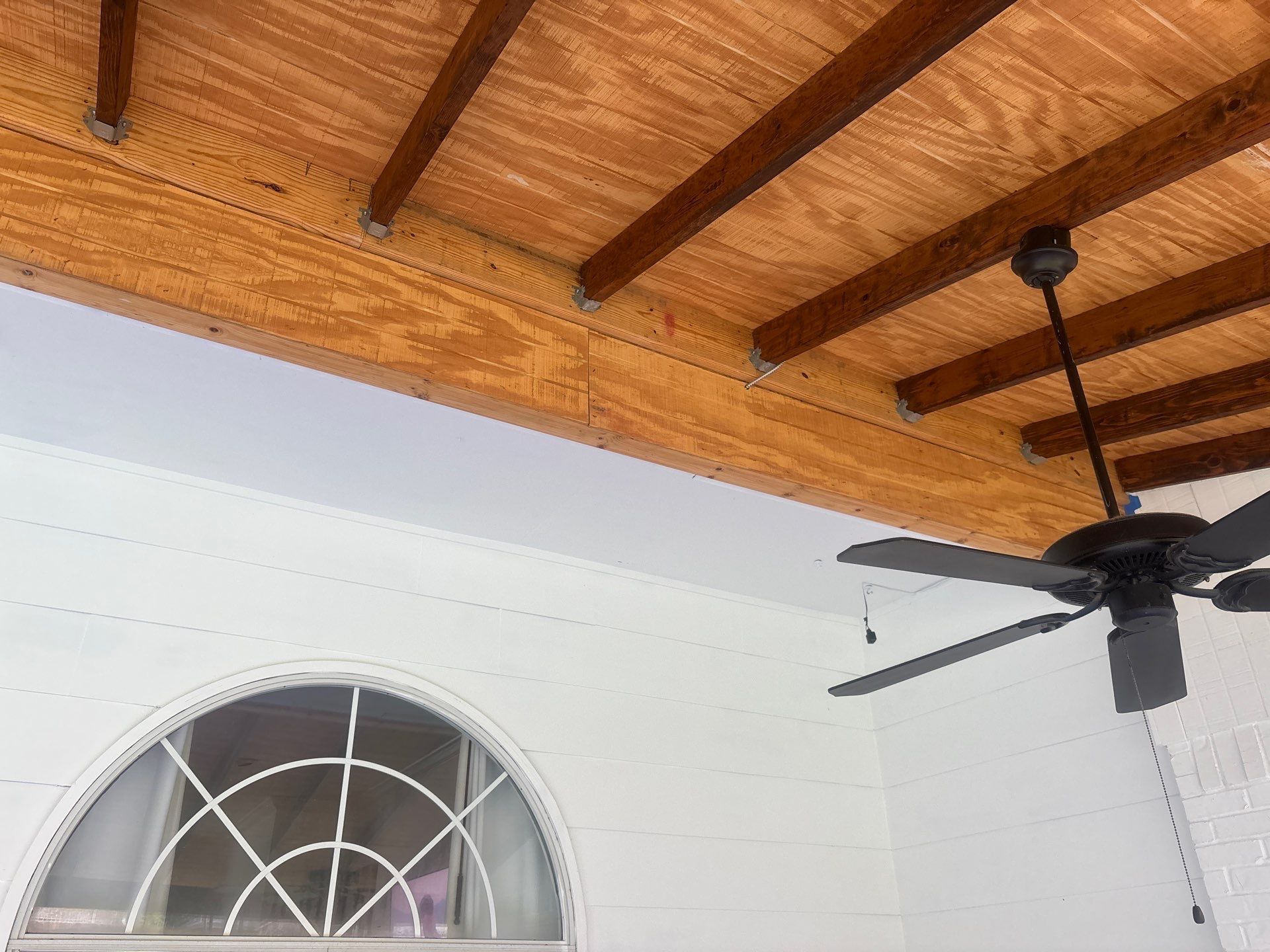 Project in TylerExterior Painting in Tyler, TX | White Brick Home, Varnished Fence & Shed Painting by Quality Coats Painting