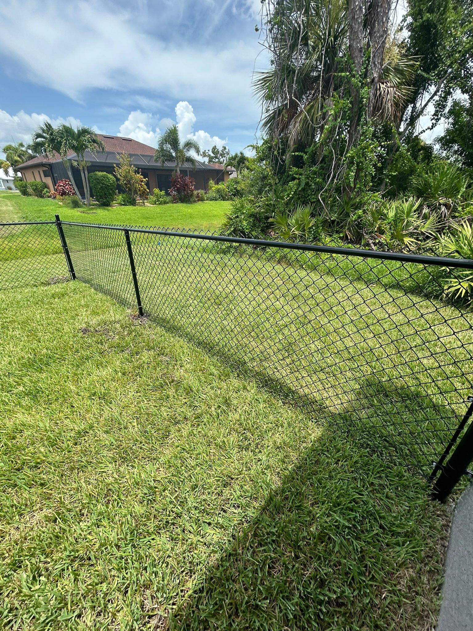 Black Chain Link Fence Installation in Rotonda West by True Fence LLC