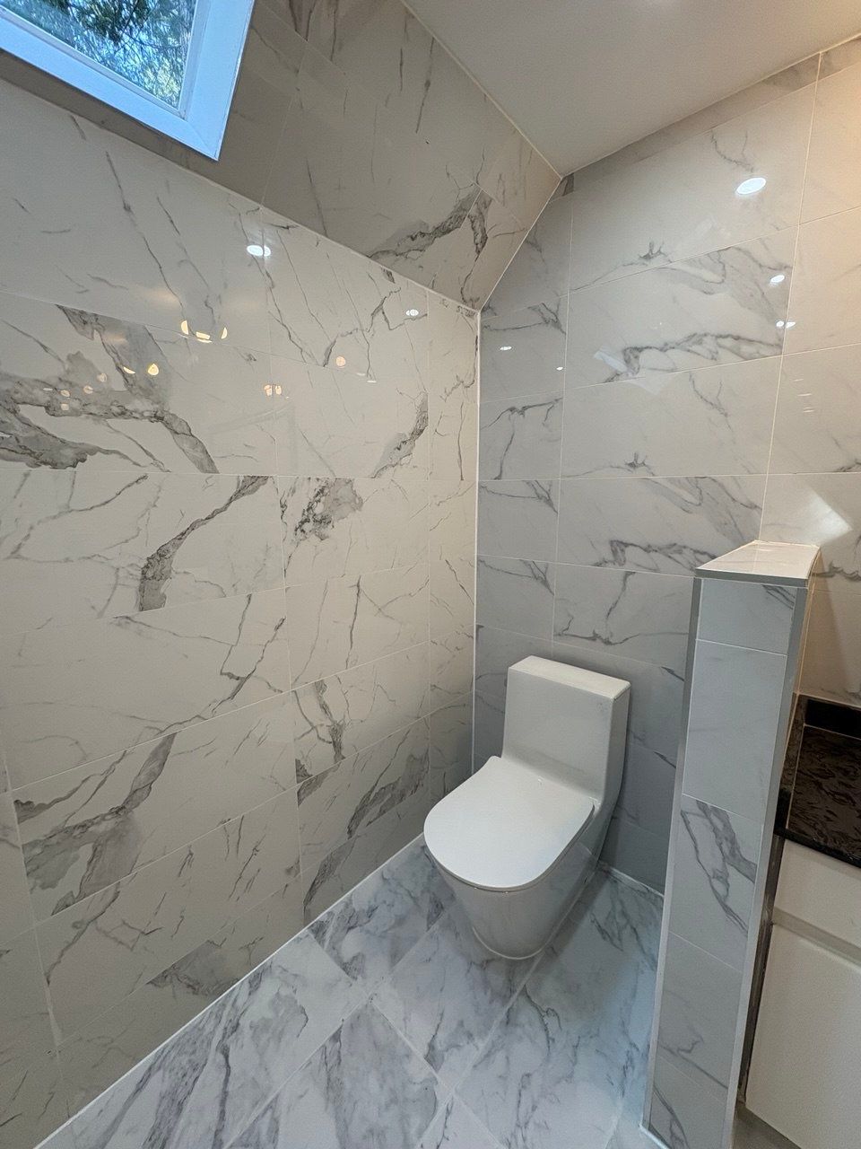 Water Damage Restoration & Bathroom Renovation in West Vancouver by YVR Construction Group