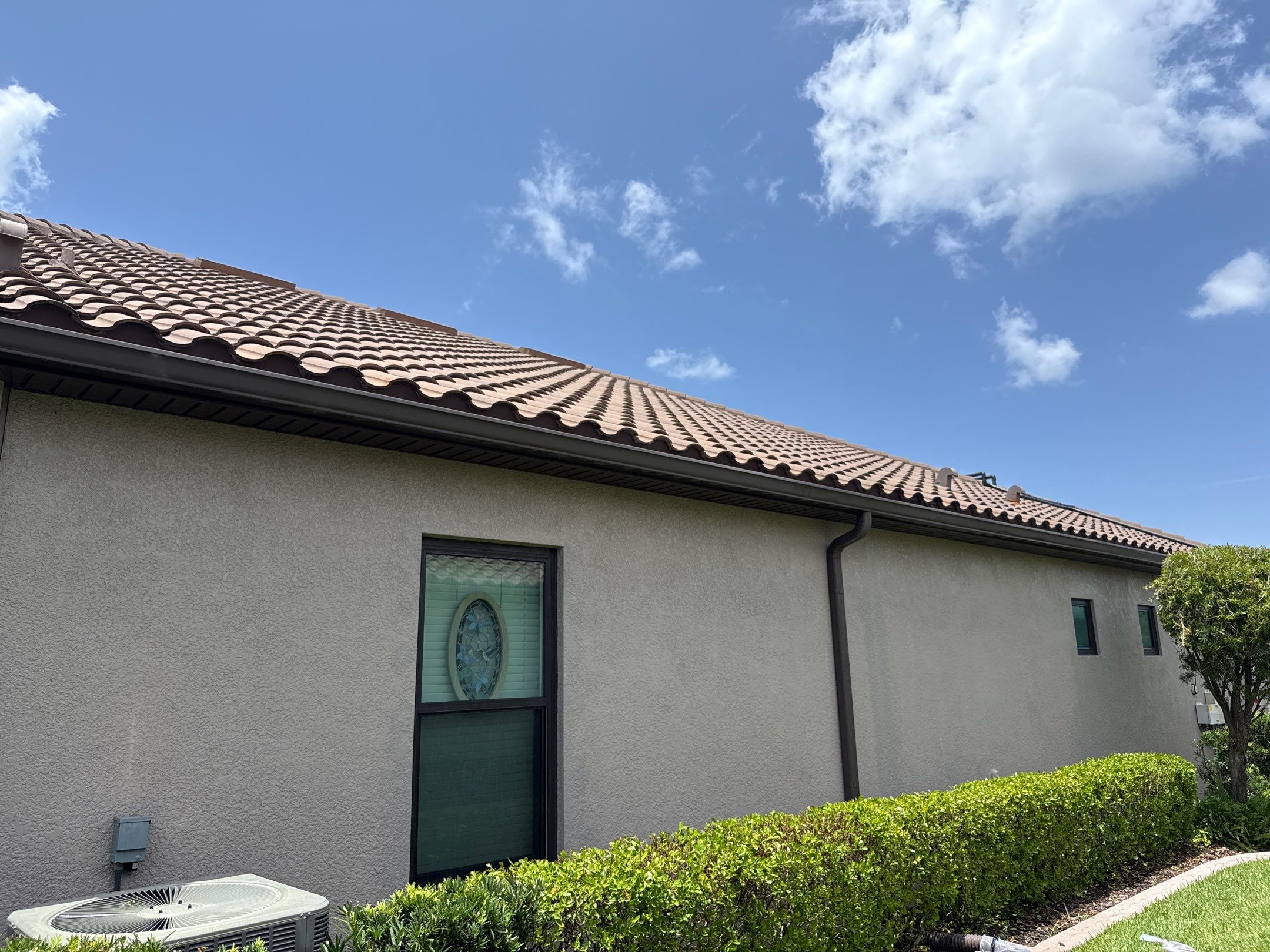 Neighboring Tile Roof Cleaning with Gutter Runoff Control – Palmetto, FL by Sunshine AquaWash