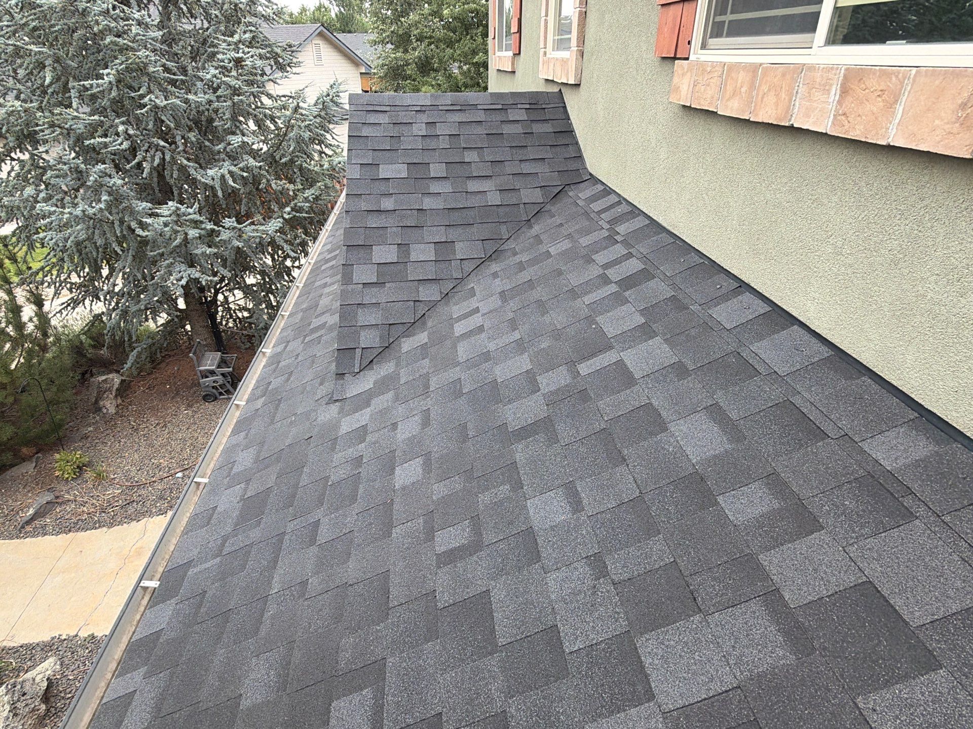 Residential Roof Replacement for Two-Story Stucco Home in Star by Olive Roofing