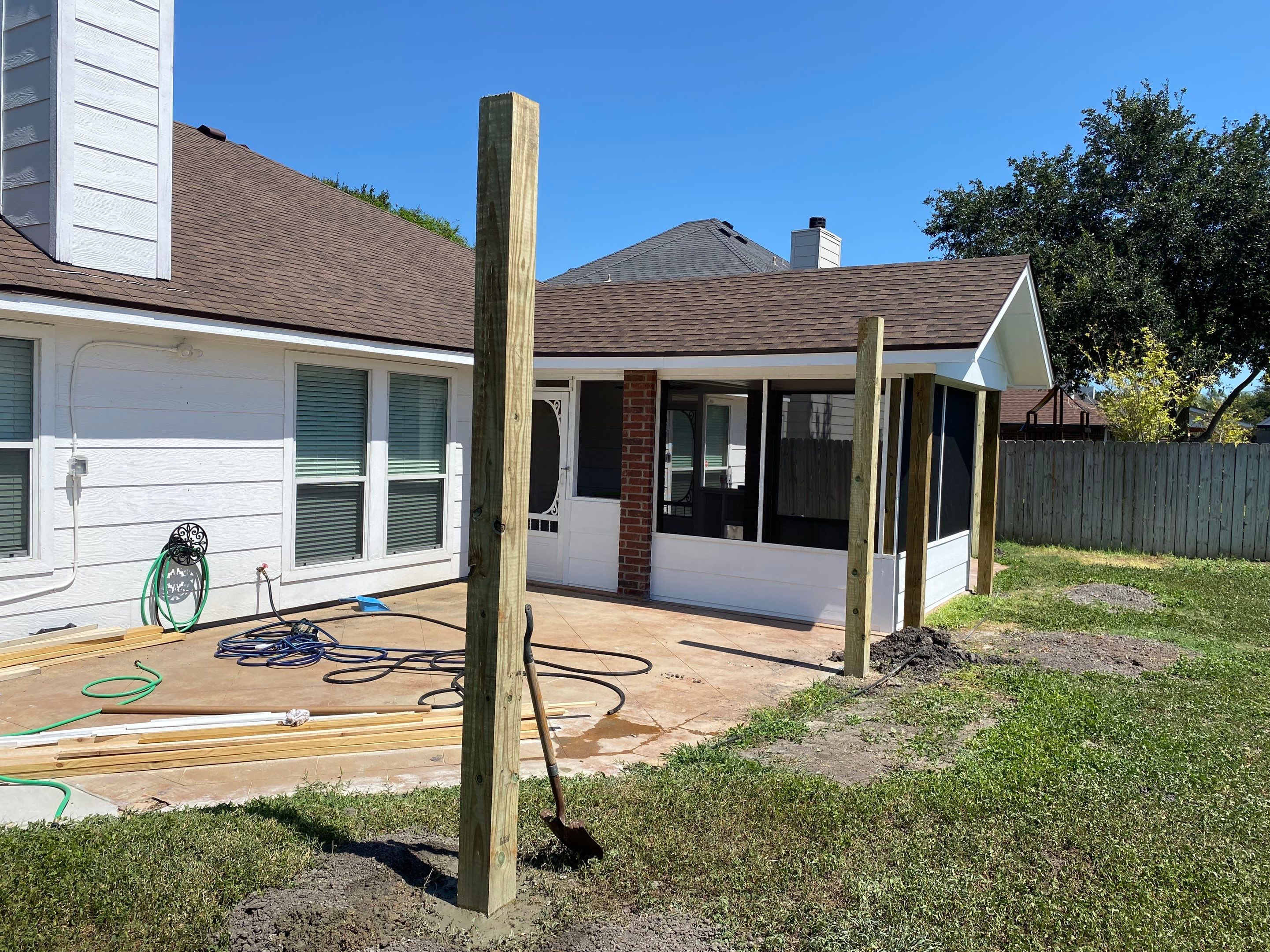 Back Yard Shade by Bayfront Roofing and Construction