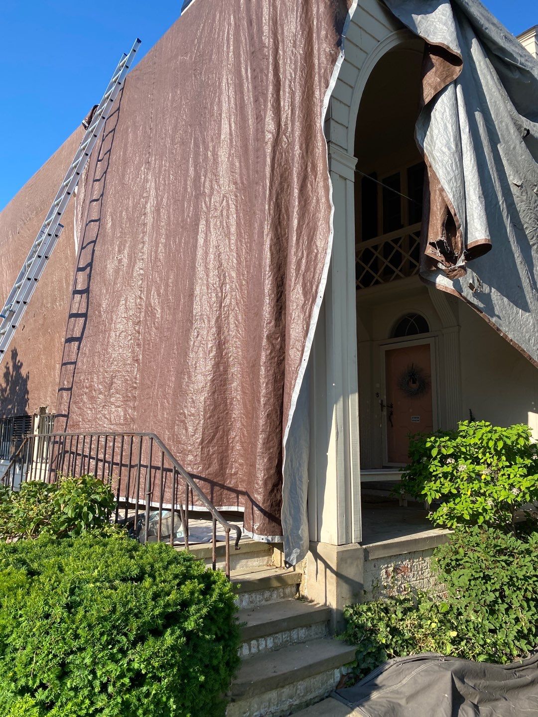 Residential Roofing Installation, Dec-tek walk-out porch roof, siding on garage by Absolute Roofing and Construction