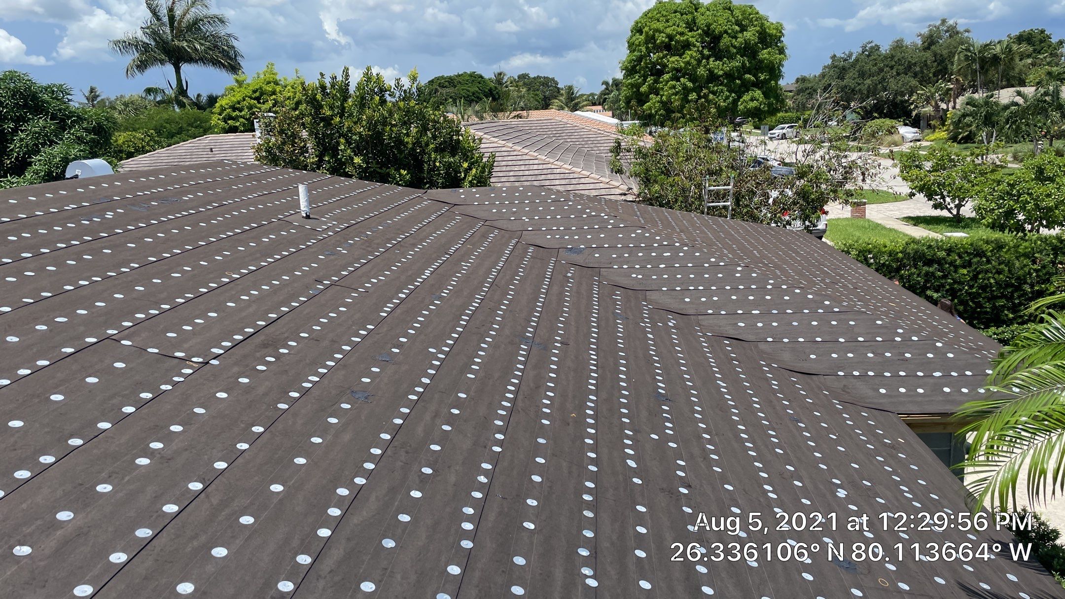 Residential Roofing Installation using 1" Nail strip metal roof by BLUES BROTHERS ROOFING