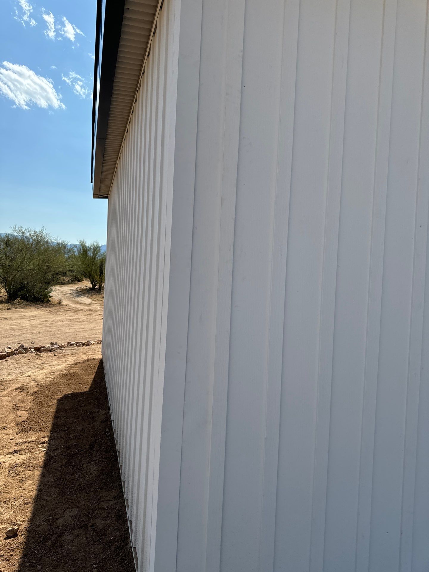 Polar White Metal Siding by Reimagine Roofing