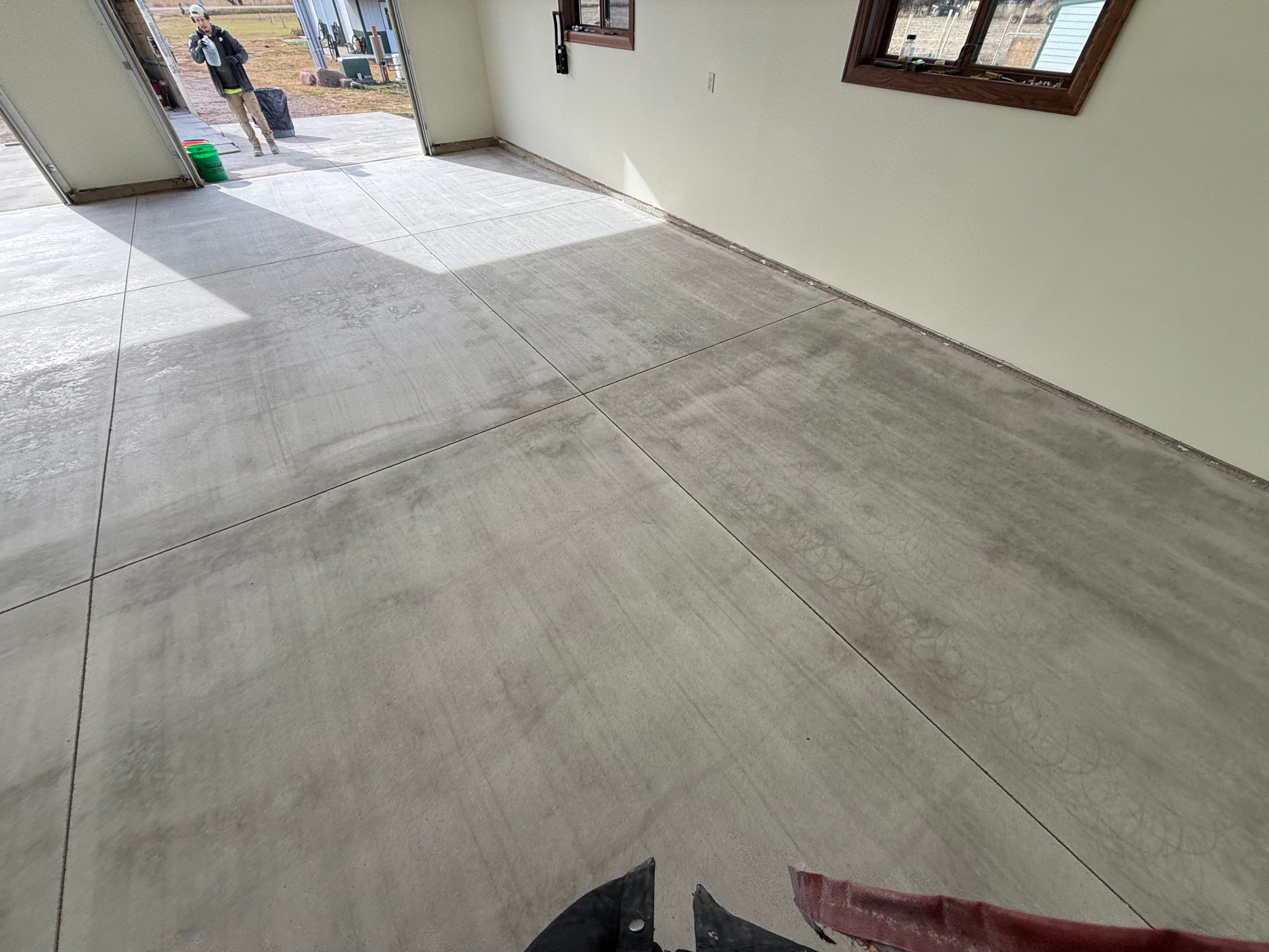 Speckled Epoxy Garage Floor Coating and Concrete Repair in Lennox by Select Painting, Coatings & Garage Cabinets